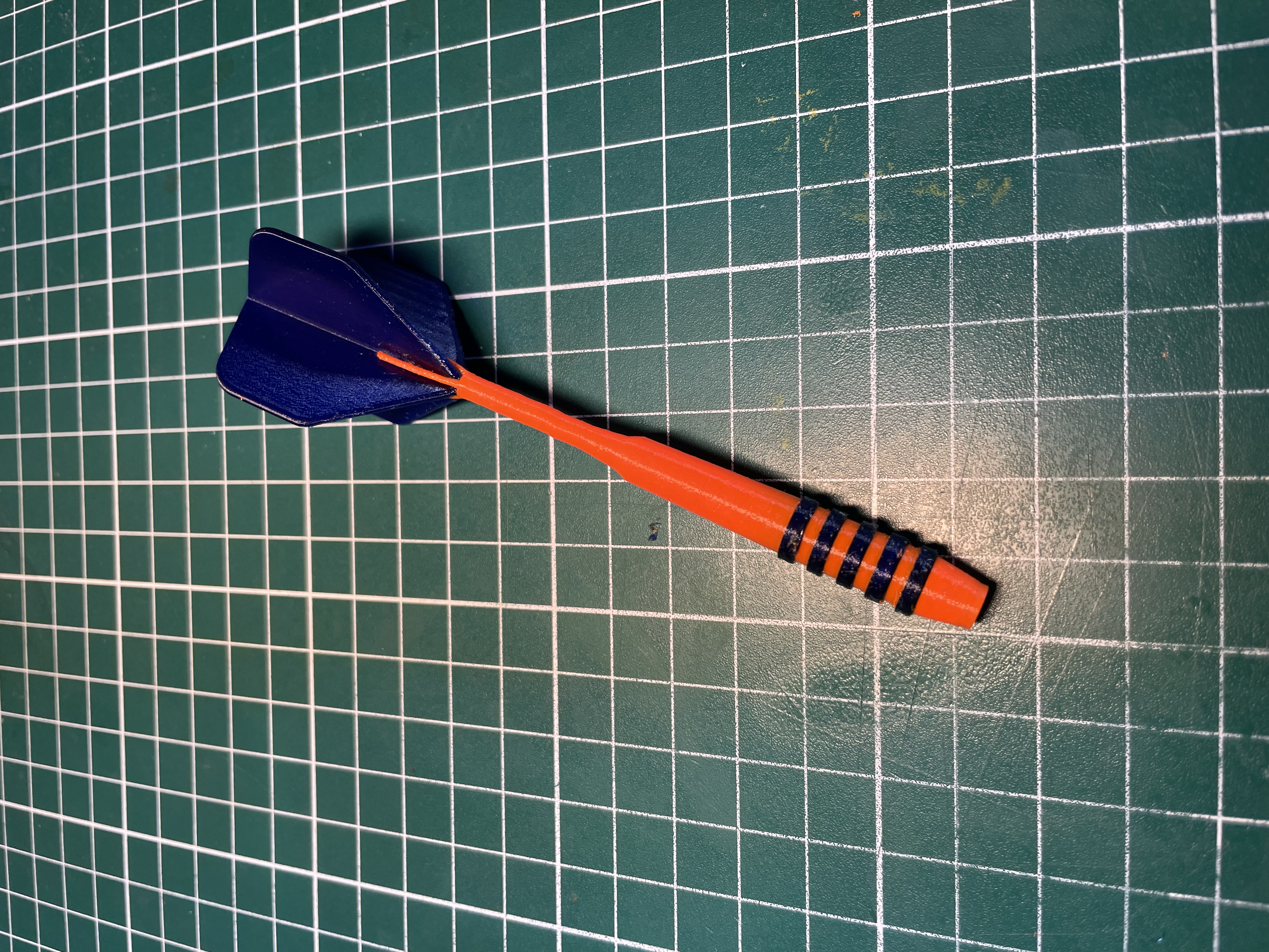 Realistic dart fridge magnet