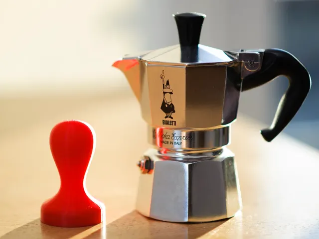 Adjustable coffee tamper