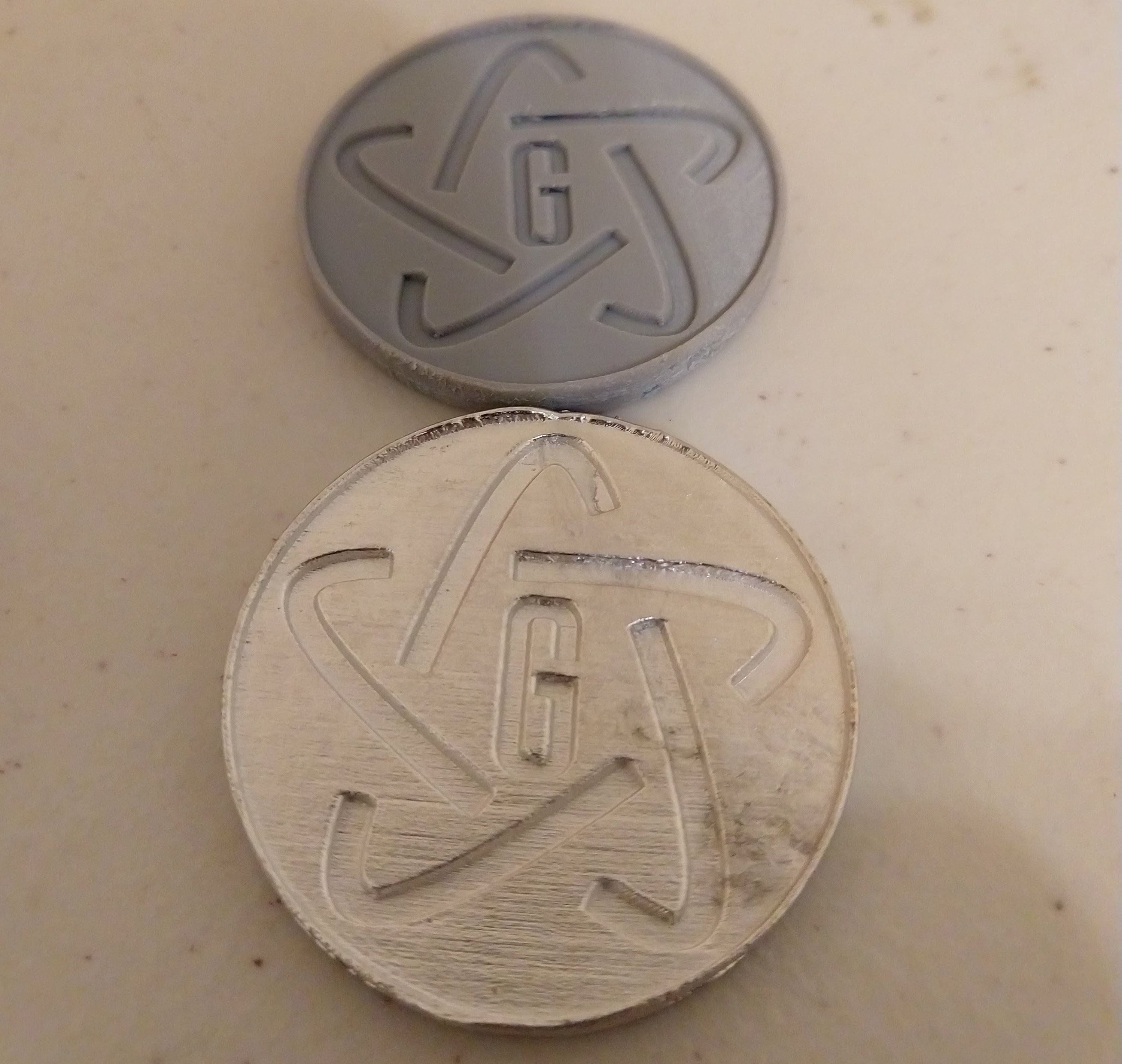 Metal cast challenge coin and mold