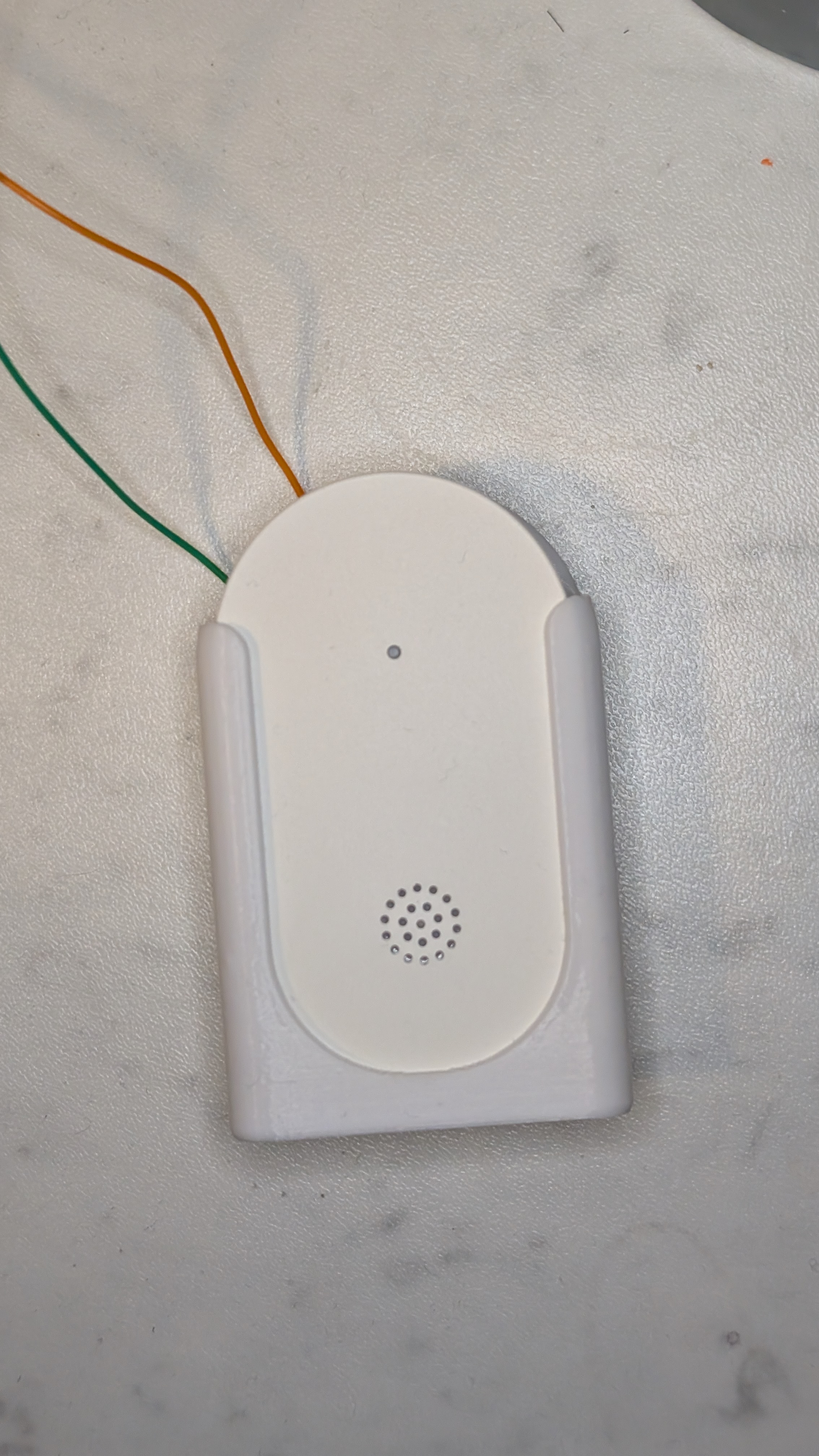 Wall mount for IKEA Klippbok sensor, with the option of attaching a cord to extend the sensor.