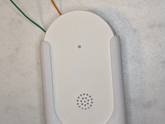 Wall mount for IKEA Klippbok sensor, with the option of attaching a cord to extend the sensor.