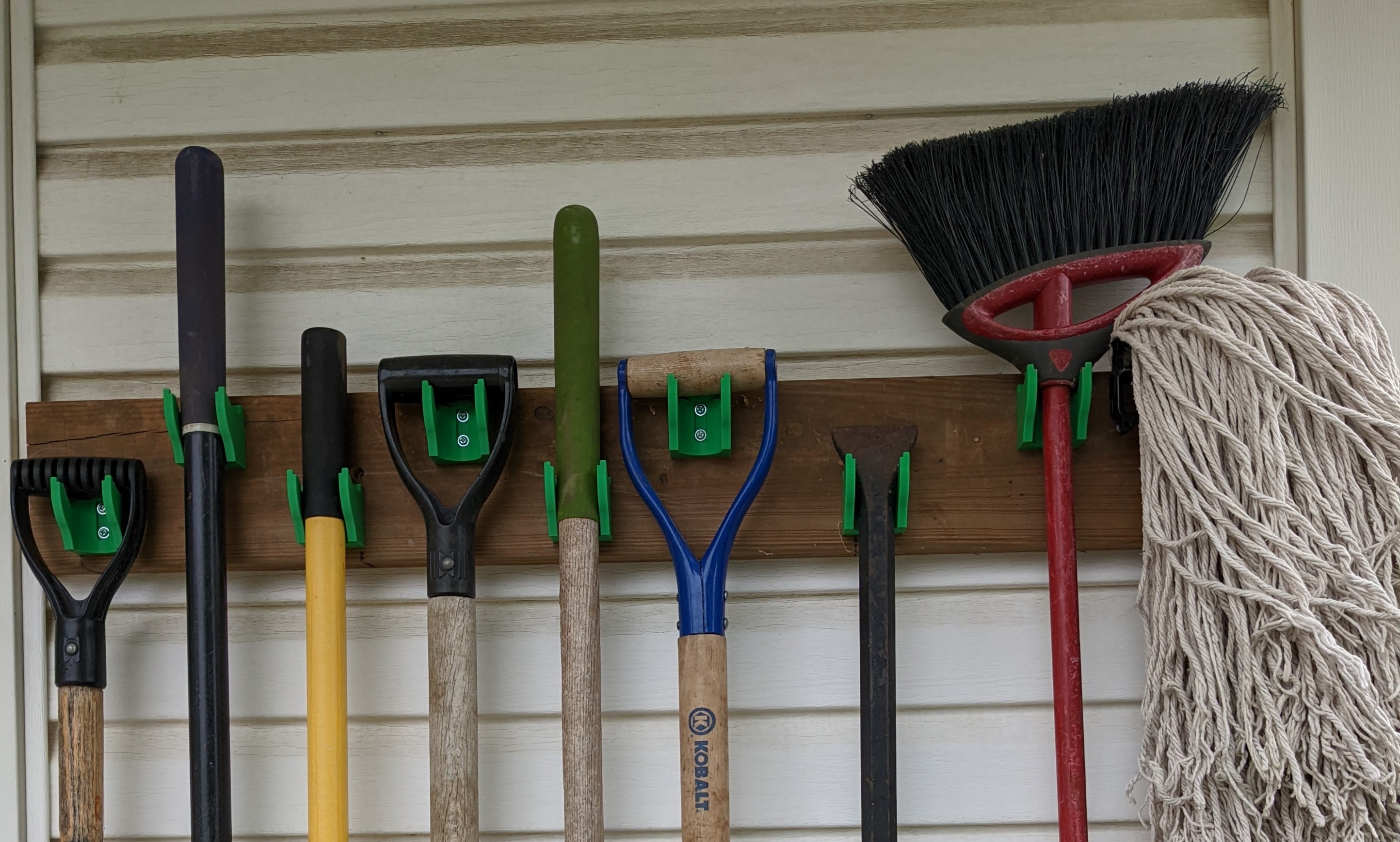 Versatile Wall Mount for Garden Tools, Canoe Paddles and More