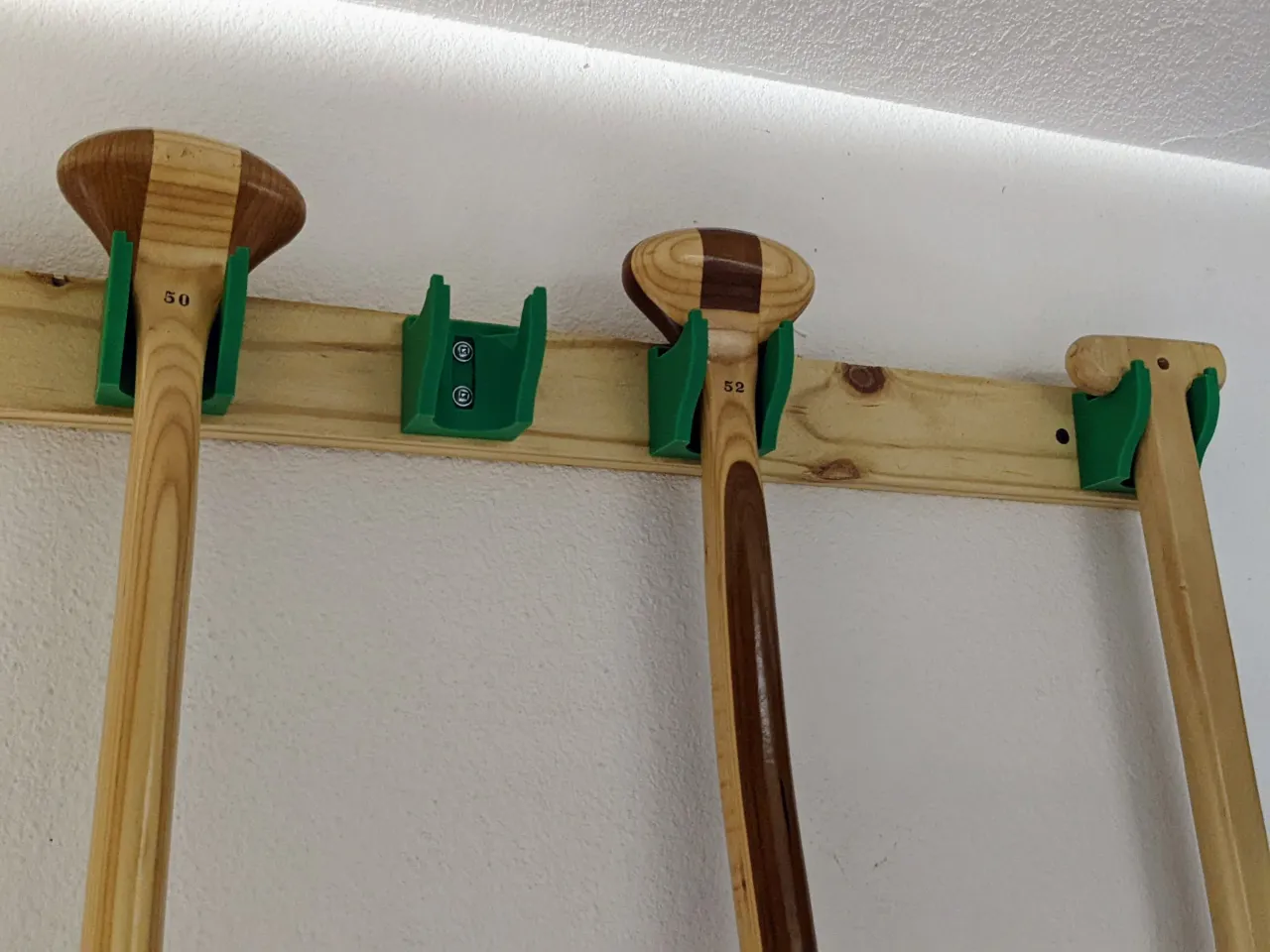 Versatile Wall Mount for Garden Tools Canoe Paddles and More by