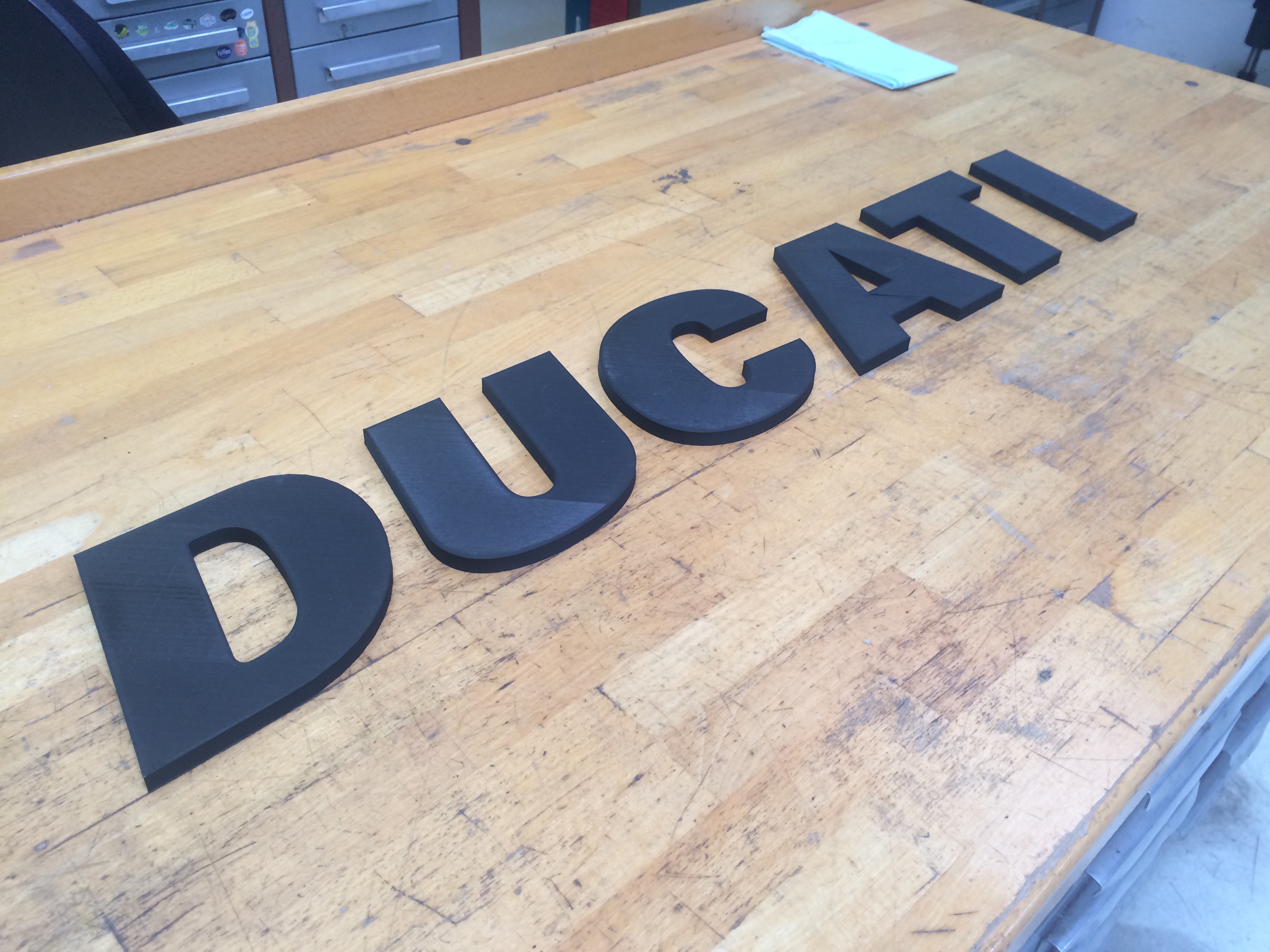 DUCATI logo on the wall