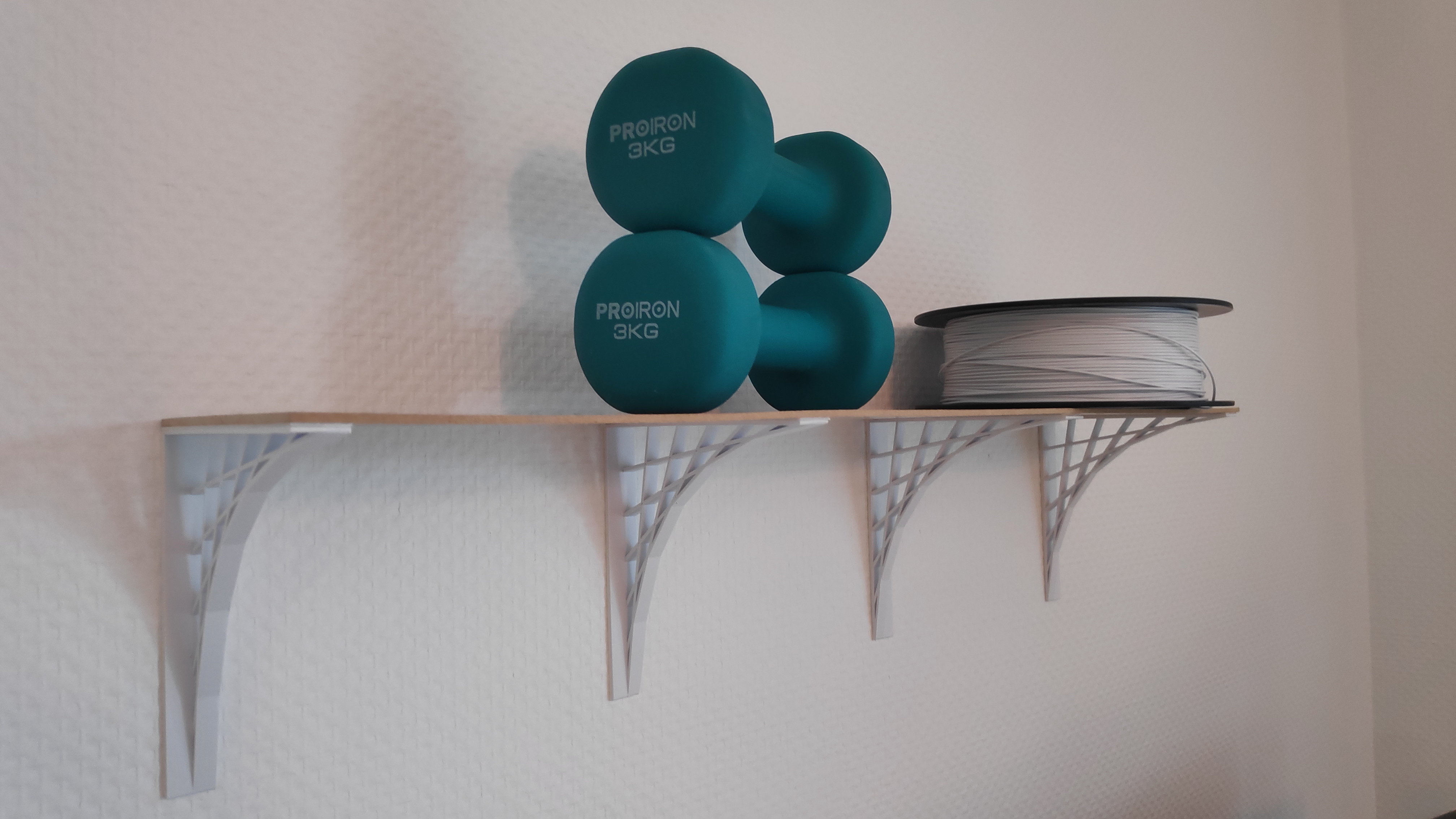 Stick-to-wall shelf bracket