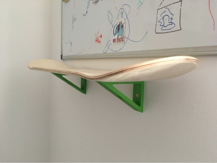 Skateboard deck shelf
