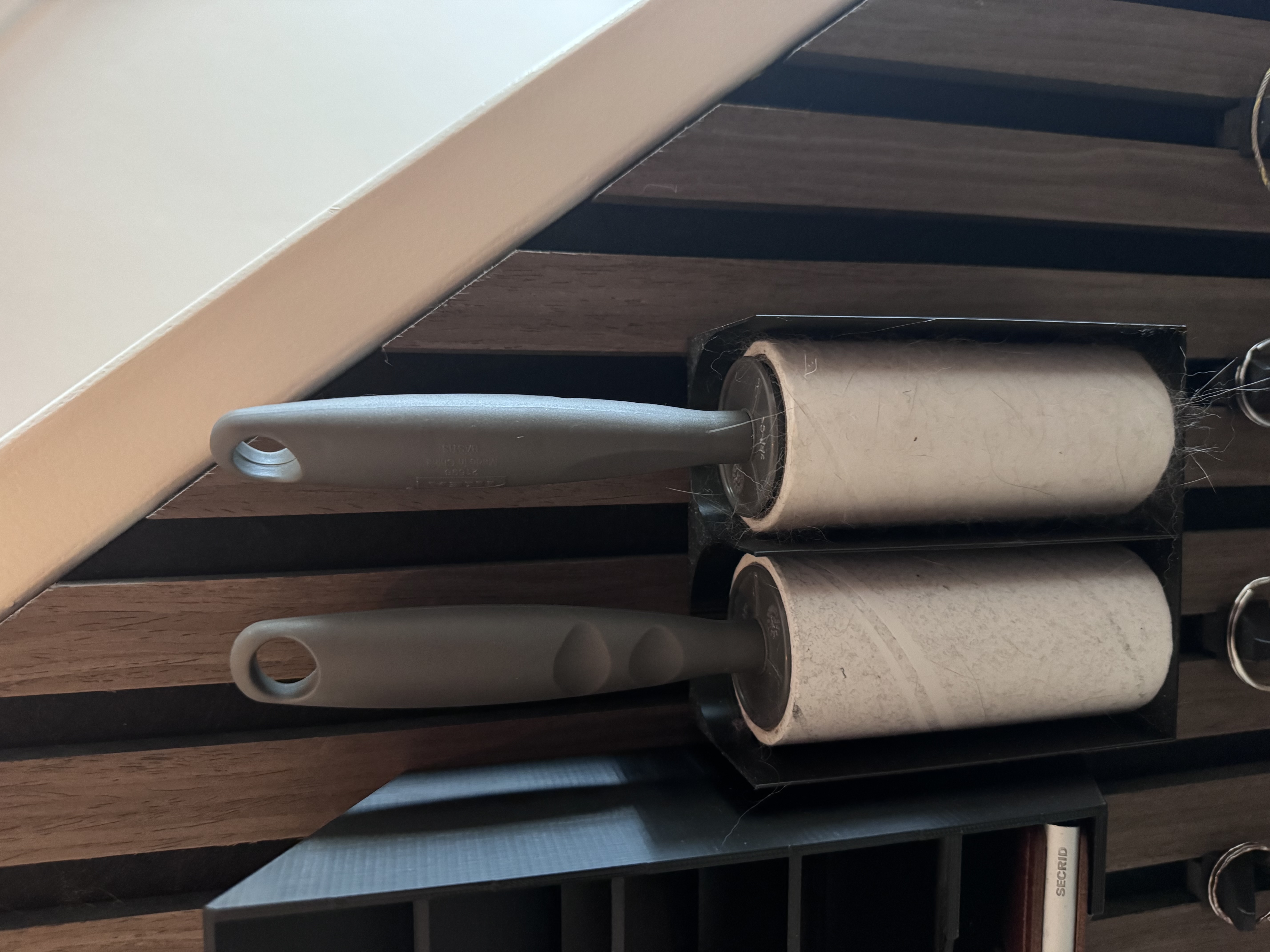 Clothing roll holder