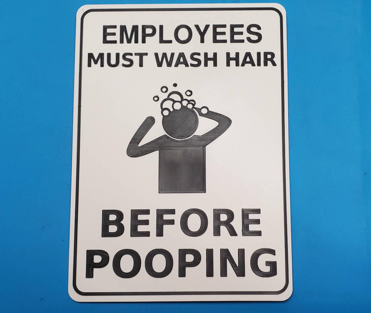 Employees Must Wash Hair