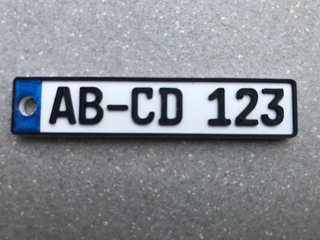 Miniatura 2 do modelo 3D Numberplate Keyring