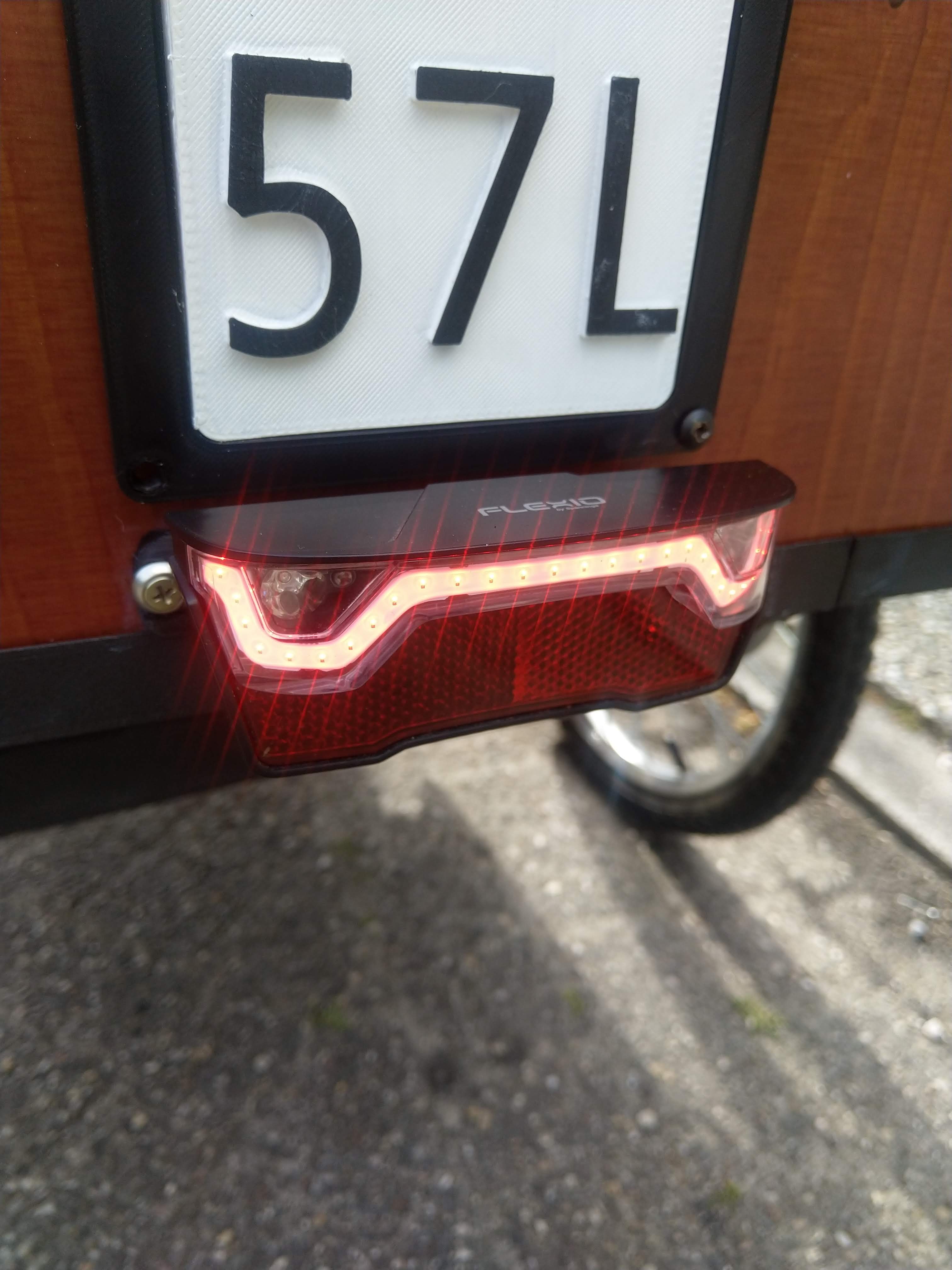 Bicycle trailer rear light holder