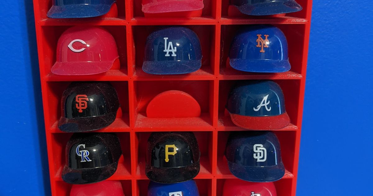 Shadowbox to display mini plastic baseball helmets by layer.works