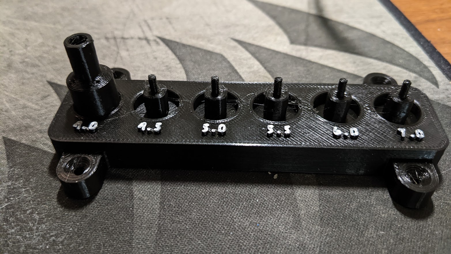 1/4" Metric Socket Wall Mount Organizer by Puxi Download free STL