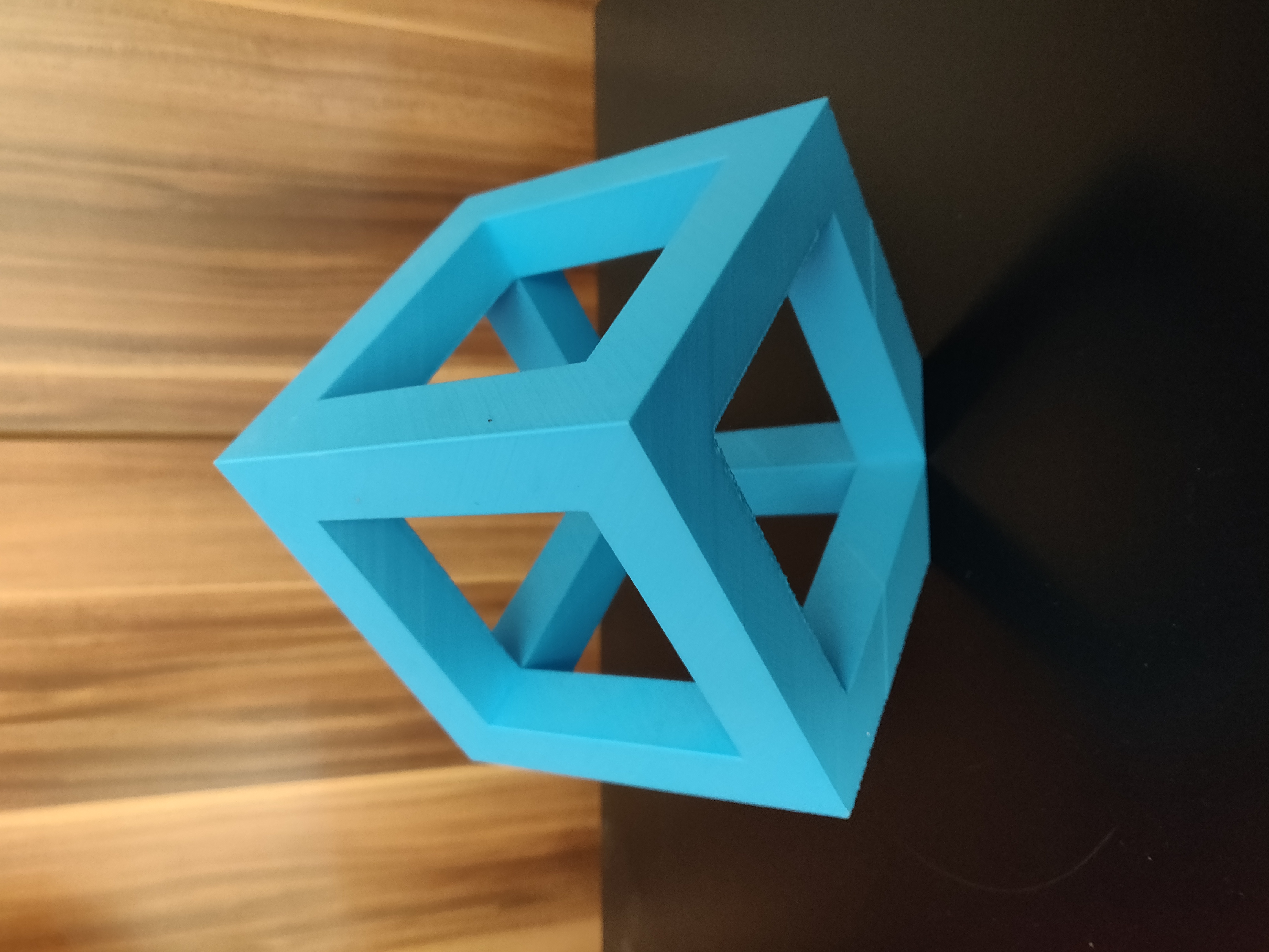 Hexahedron - geometric cube with cutouts for decoration