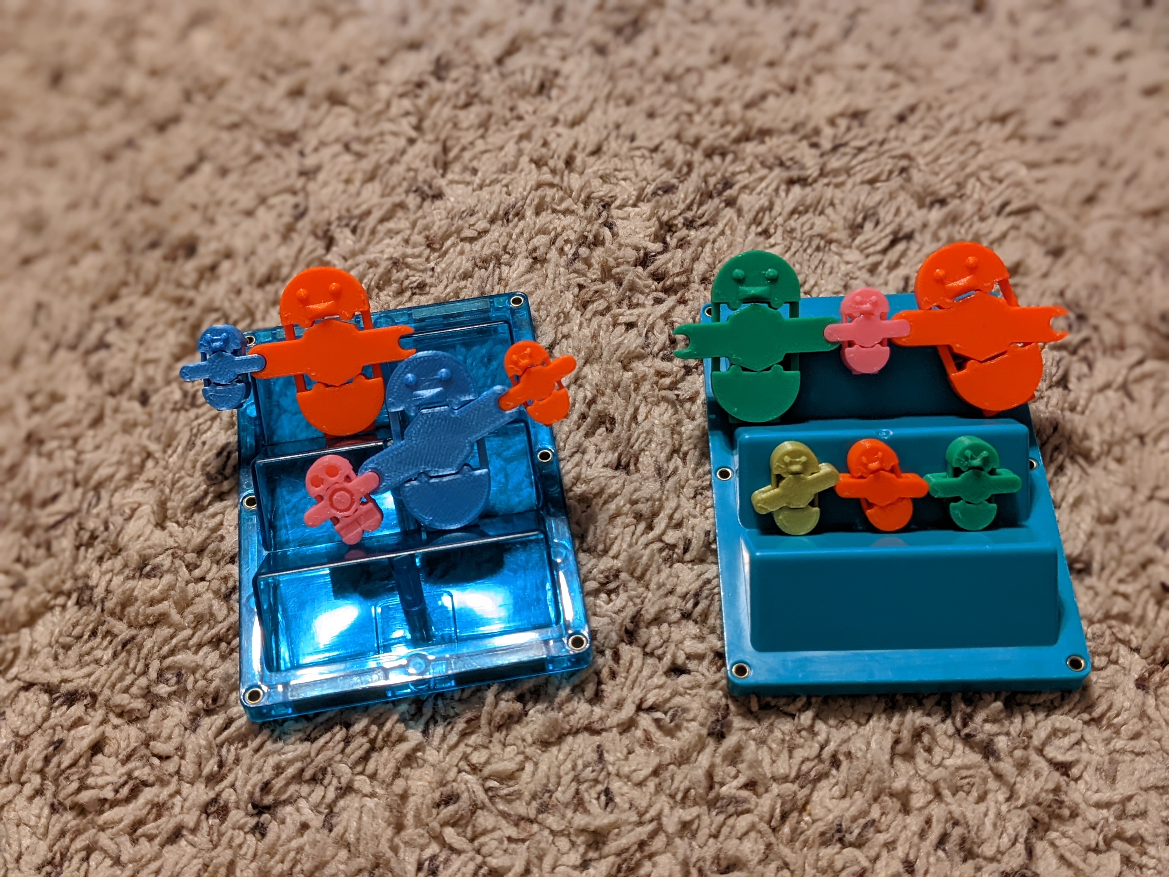 Penguin Baby & Mama Fidget Toy with Snappy Arm Movement (an Octoswitch toy)
