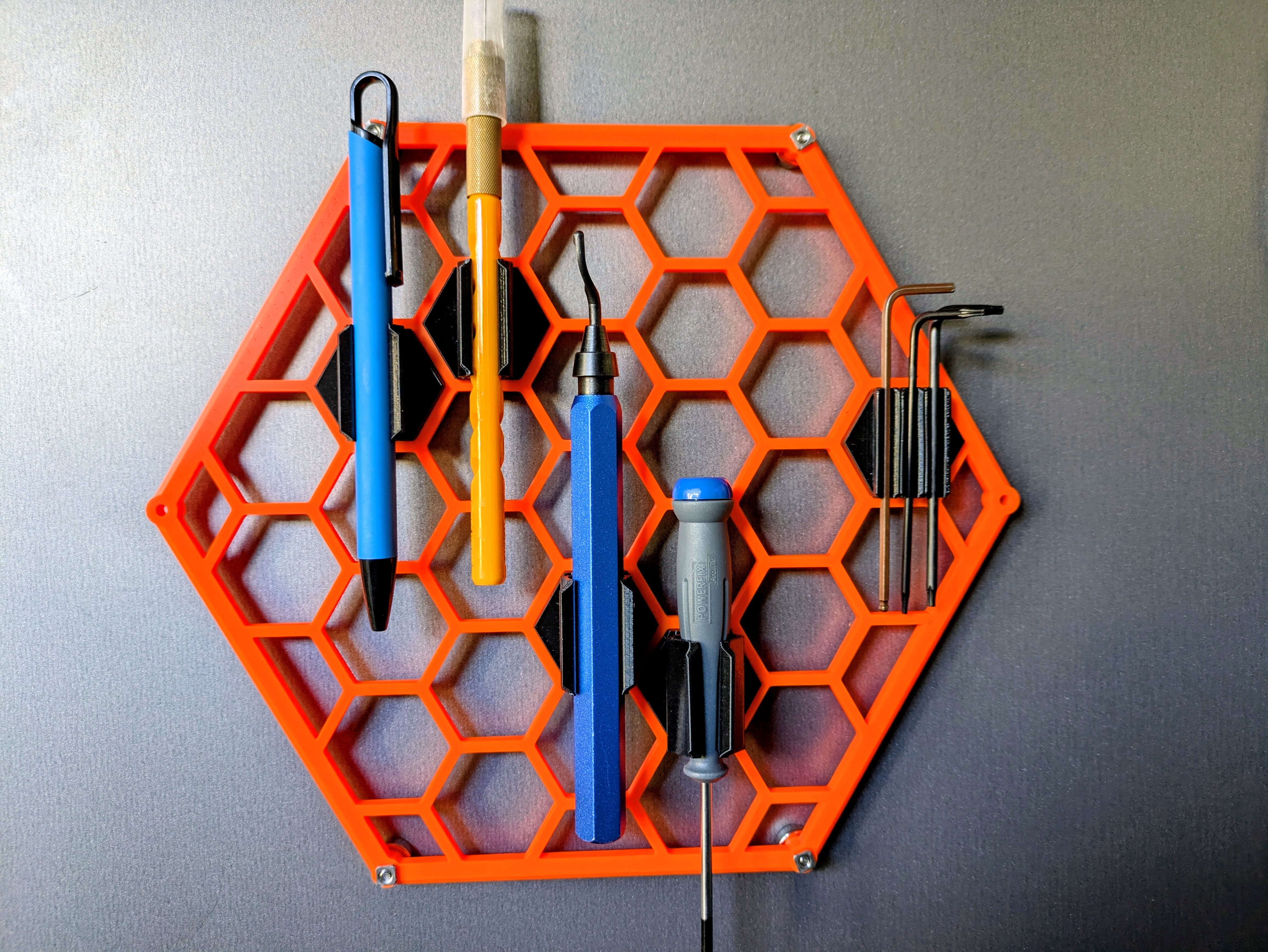 Hexagonal tool board with flexible TPU mounts
