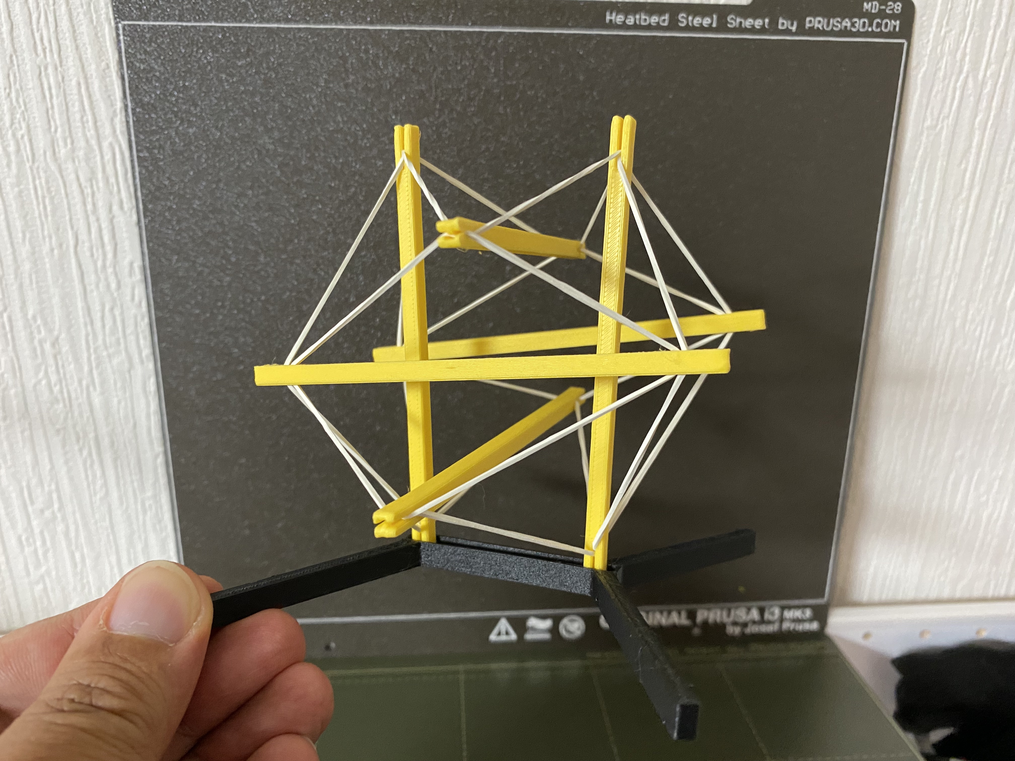 Tensegrity compressed material
