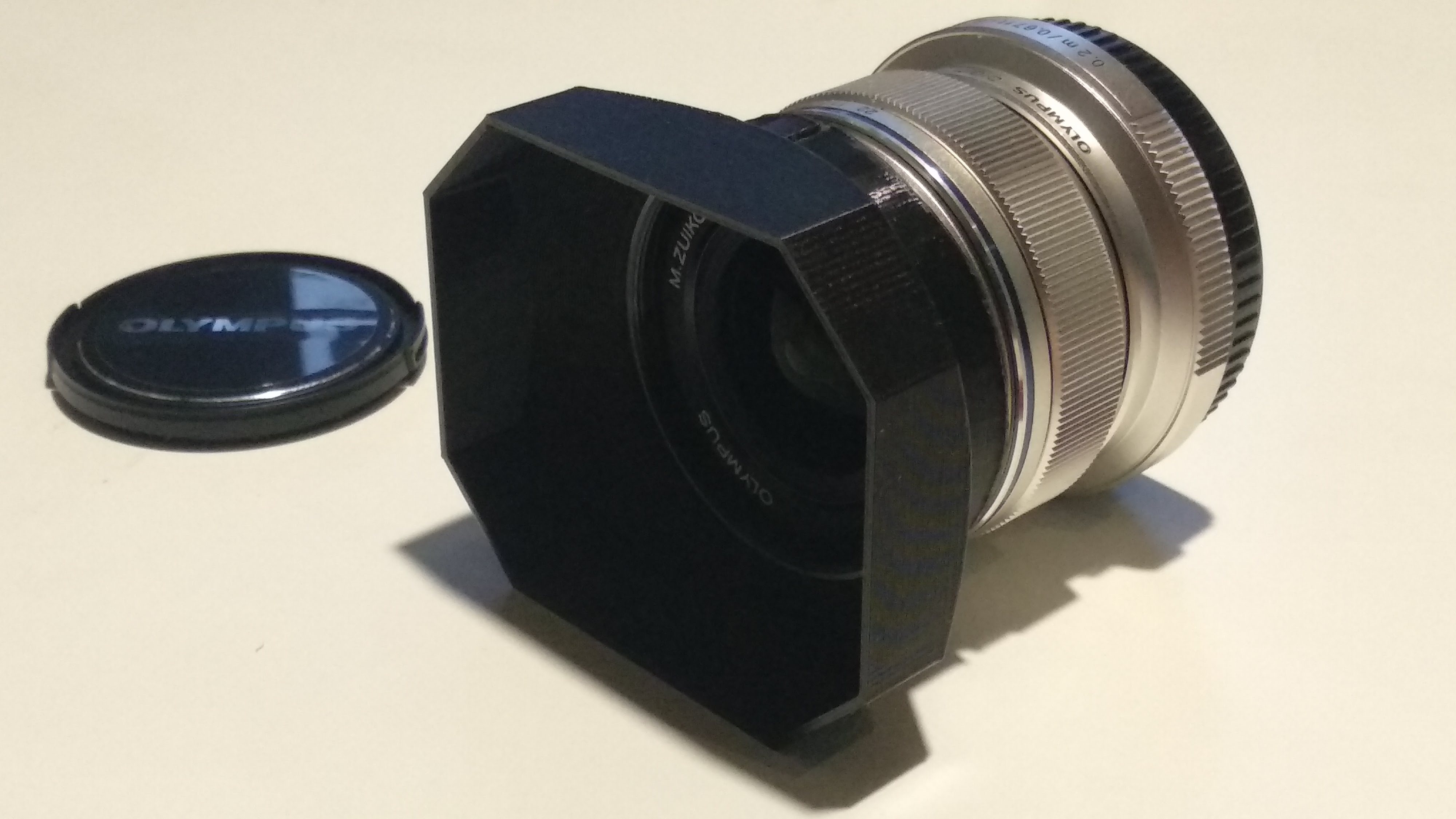 Olympus 12mm f 2.0 Lens Hood by occupied_brain Download free STL