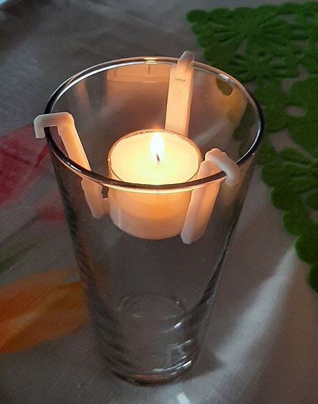 Variable movable tealight holder