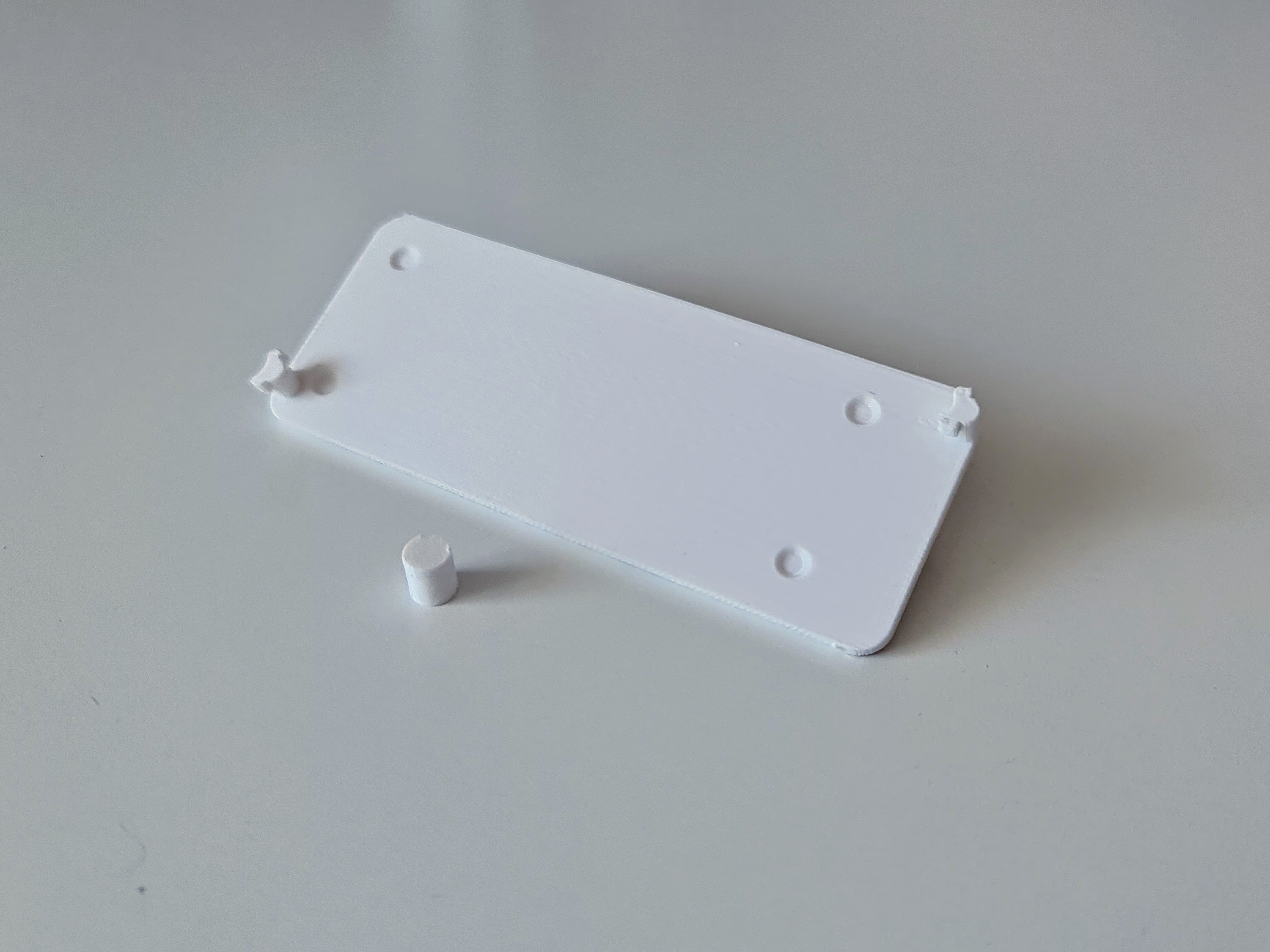 IKEA KOPPLA extension cord mount for IKEA SKADIS pegboard by Fraxinus