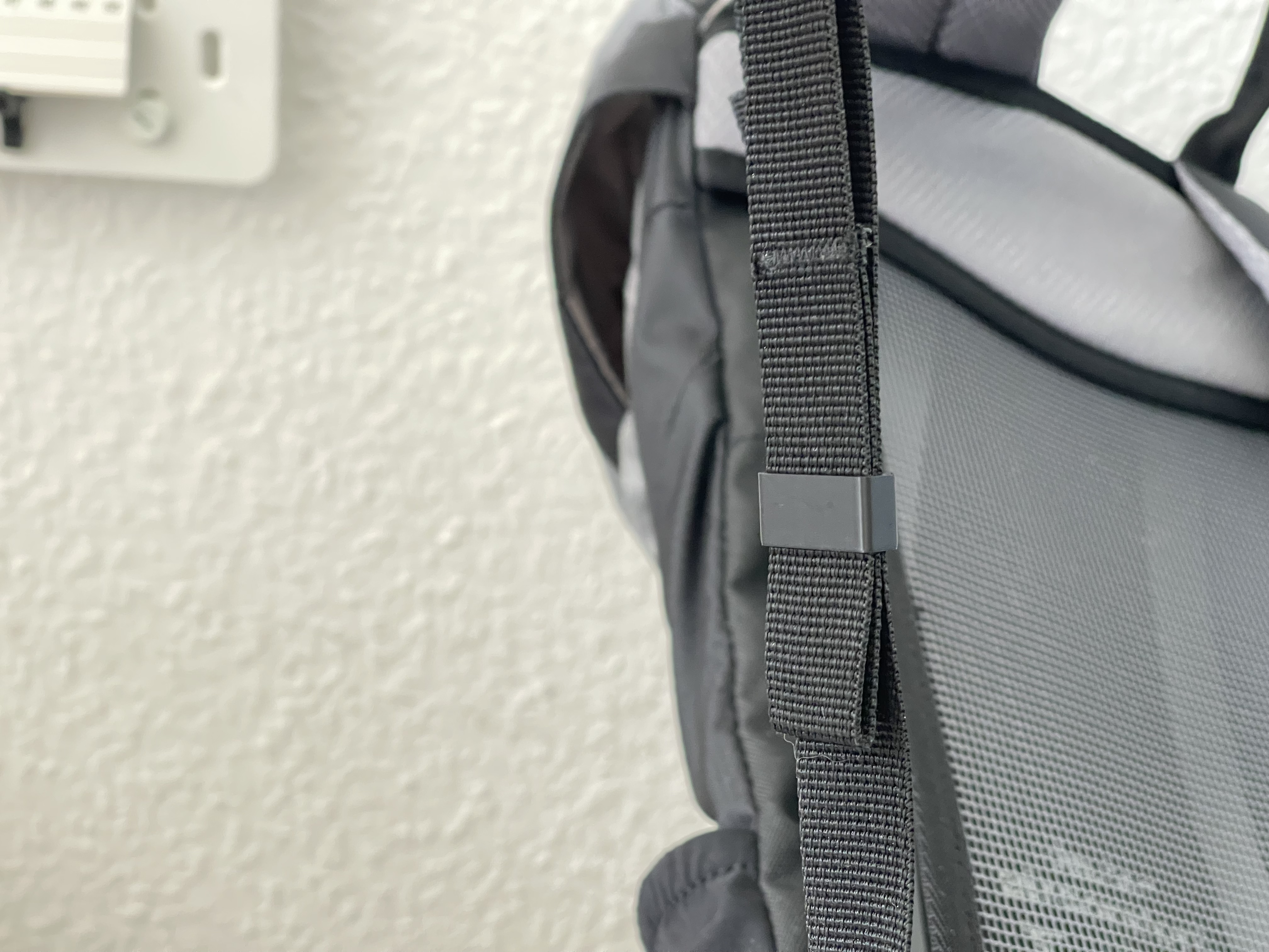 Parametric backpack strap clip