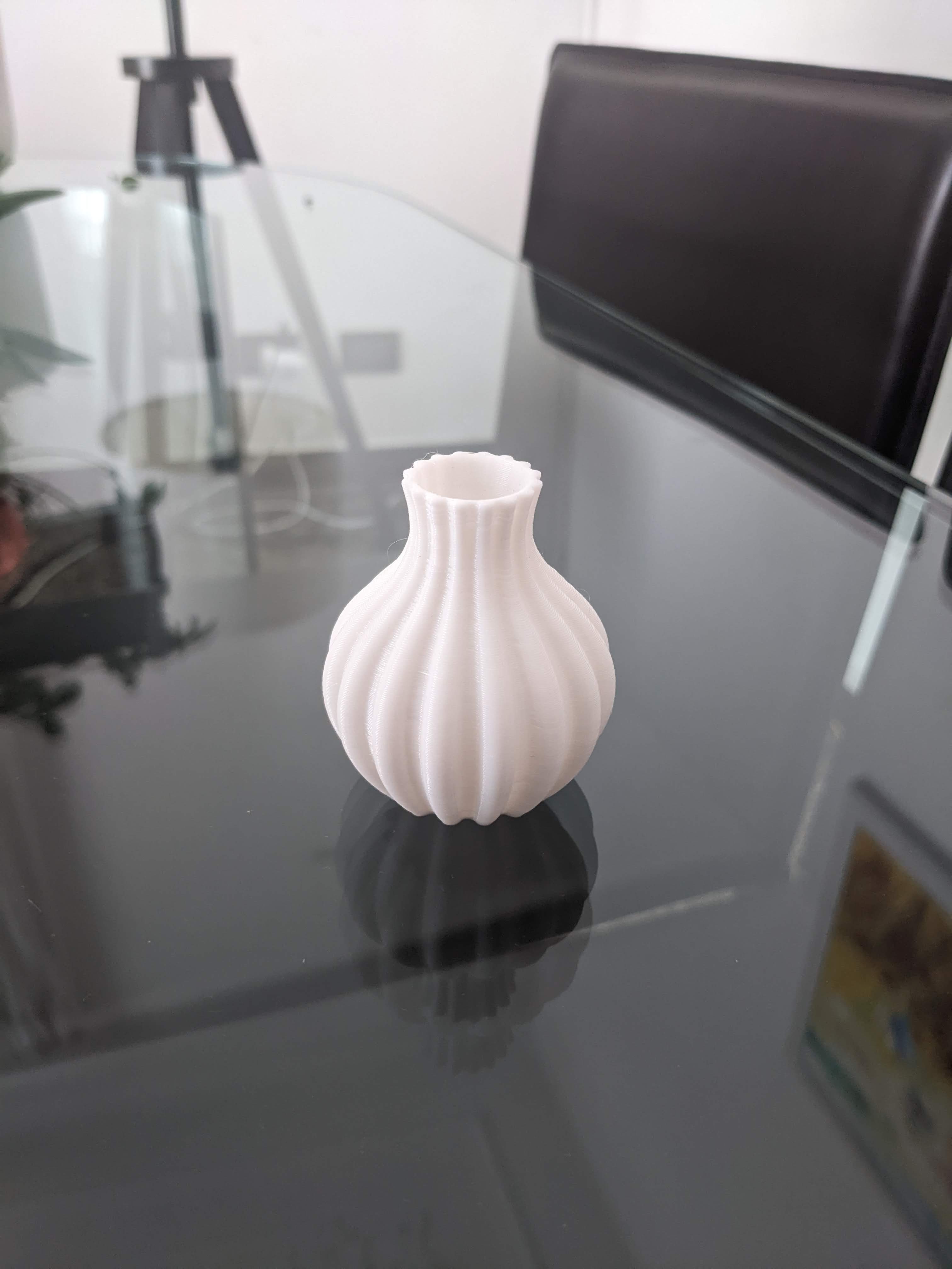 Simple small bulbous vase