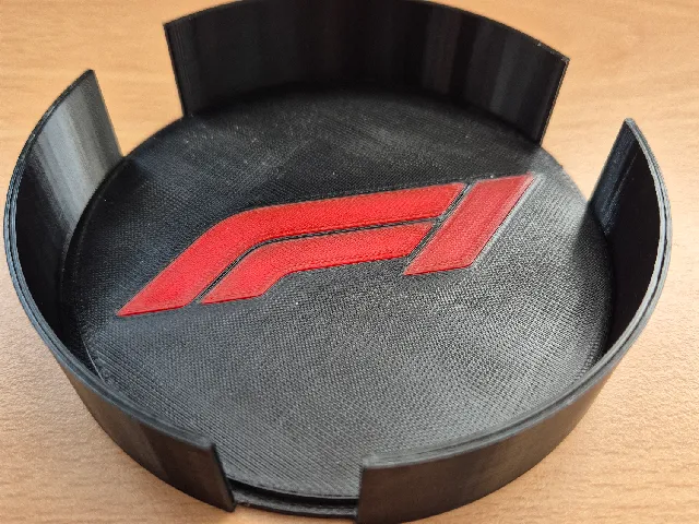 Formula 1-themed coasters and a coaster holder.