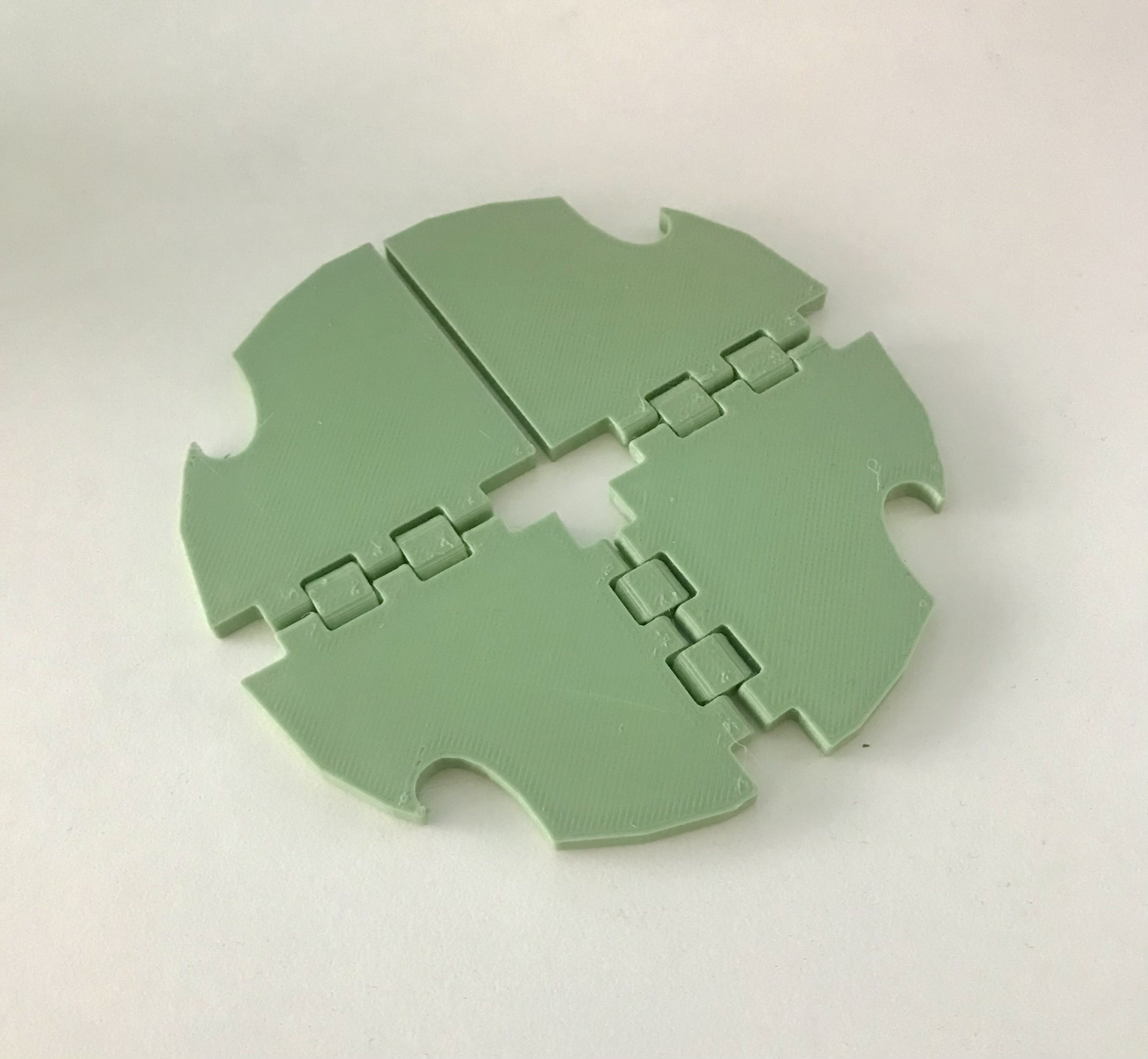 Foldable coaster with bottle opener