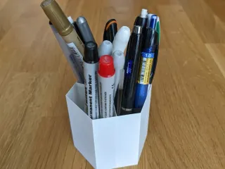 STL file Hexagonal Paint Brush / Pen Holder 🎨・3D print object to