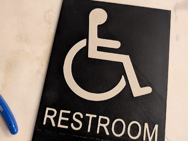 Accessible unisex restroom sign
