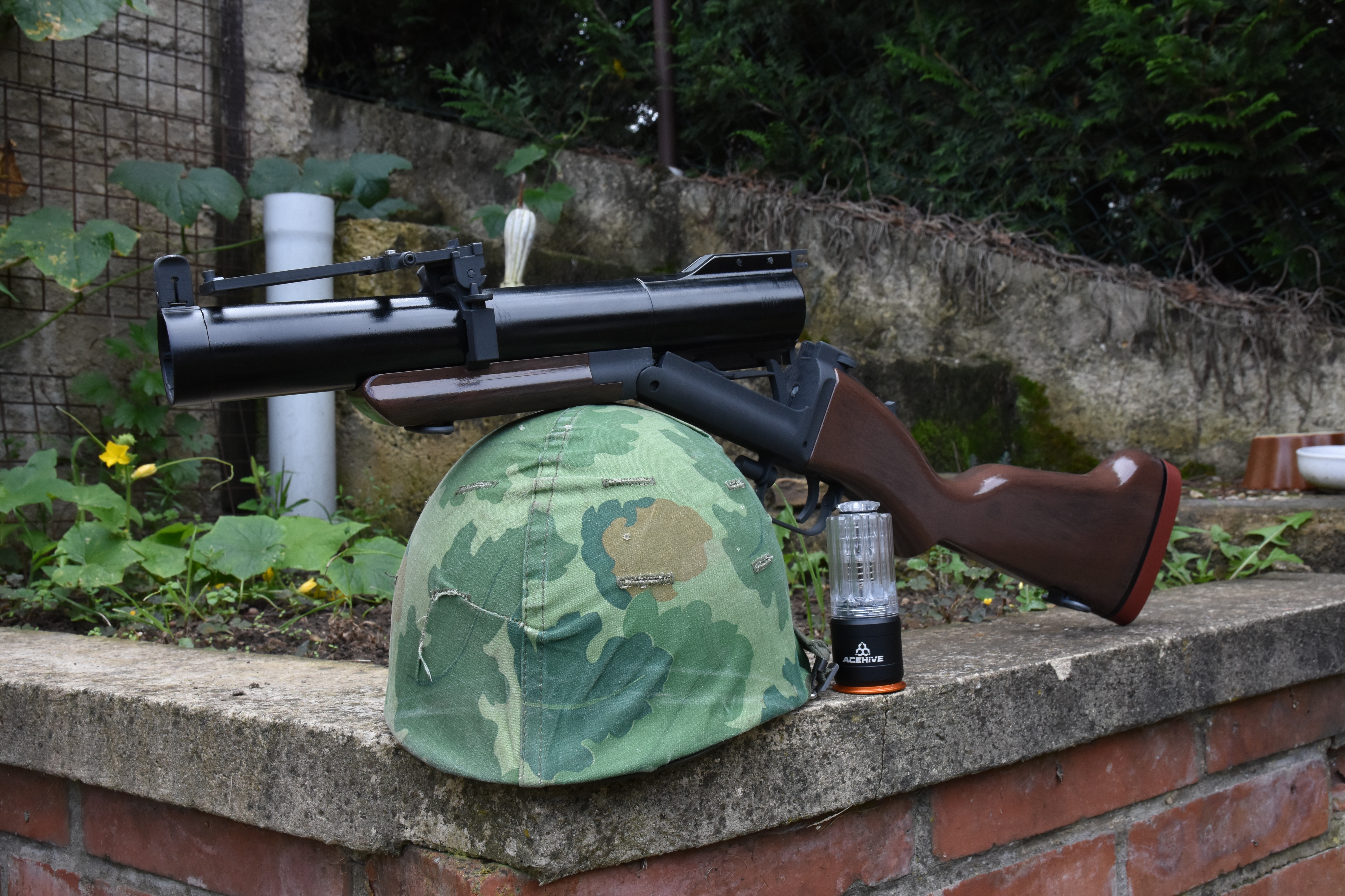M79 Airsoft 40mm gas grenade launcher prop with KANARR CORP markings and realistic parts.