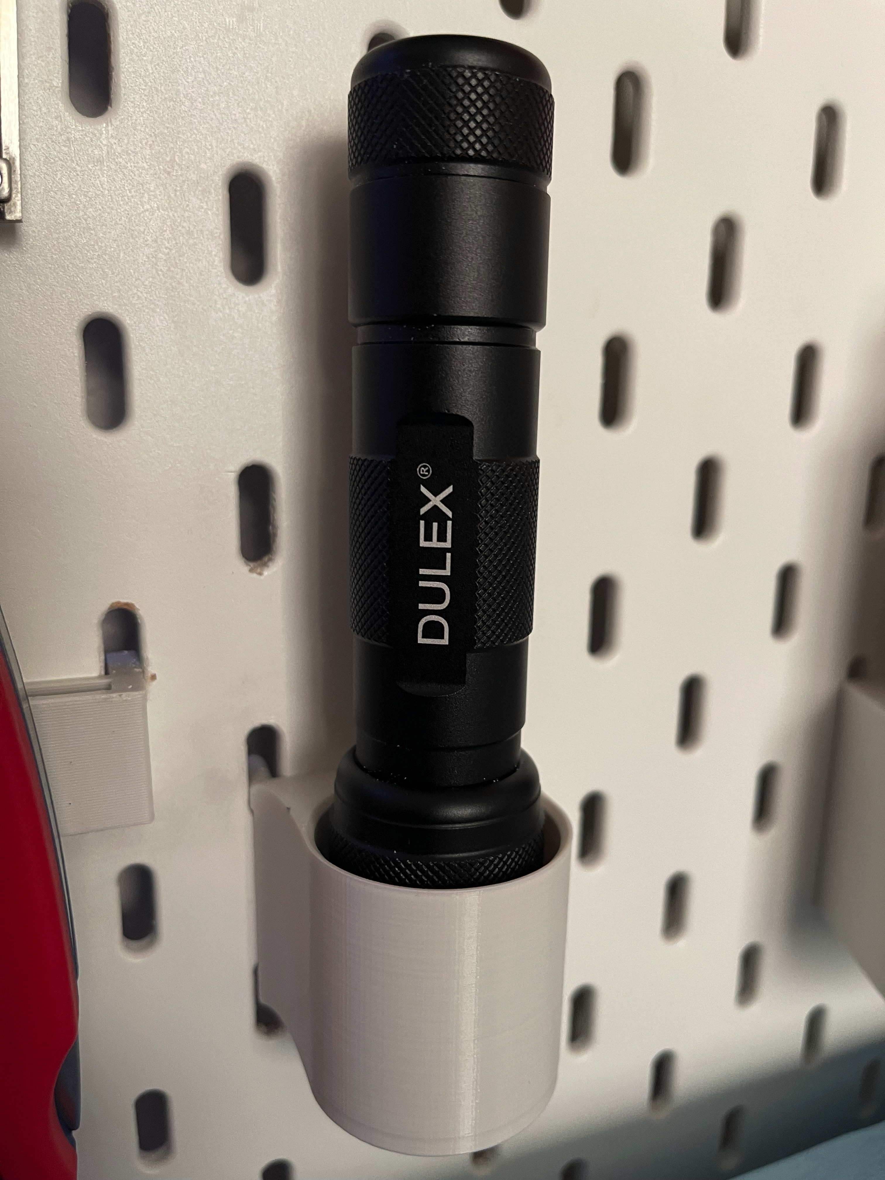 Skadis 35mm flashlight holder