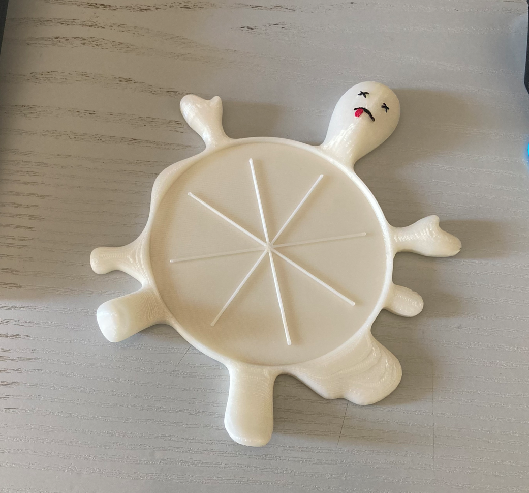 Squished guy coaster.