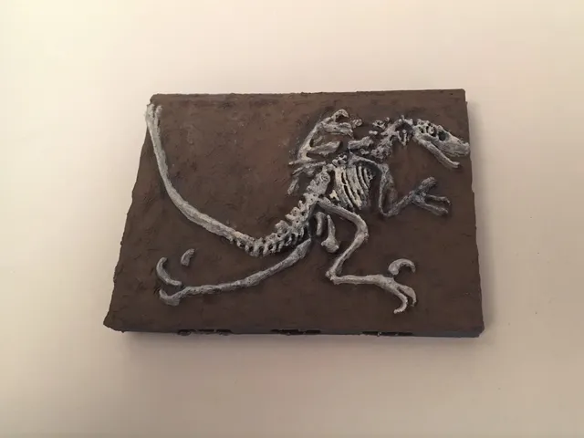 Miniature Velociraptor Fossil