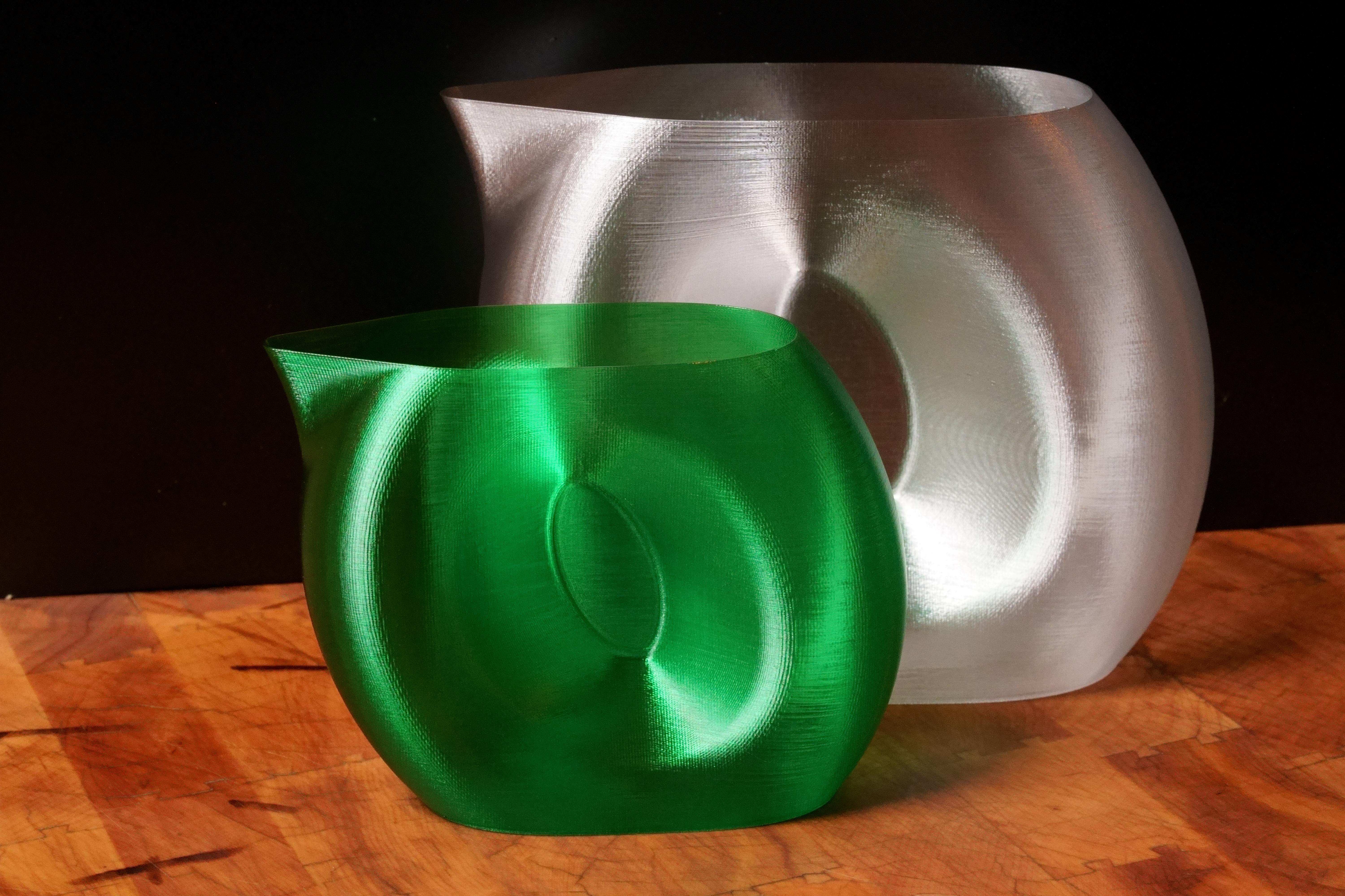 Spiraled Pitcher for the Wrangling of Cats, Di-hydrogen Monoxide and other Fluids
