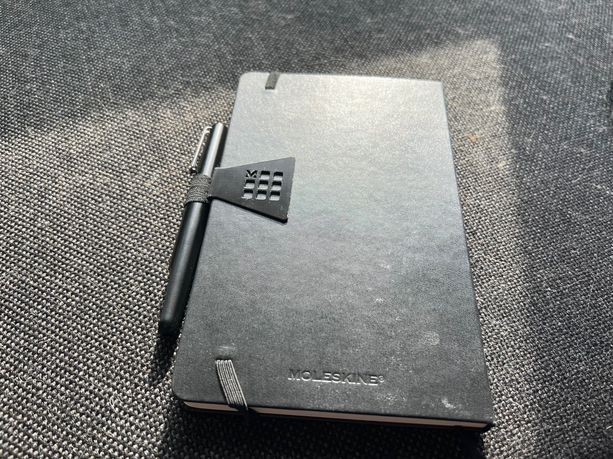 Notebook (Moleskin) pen loop clip