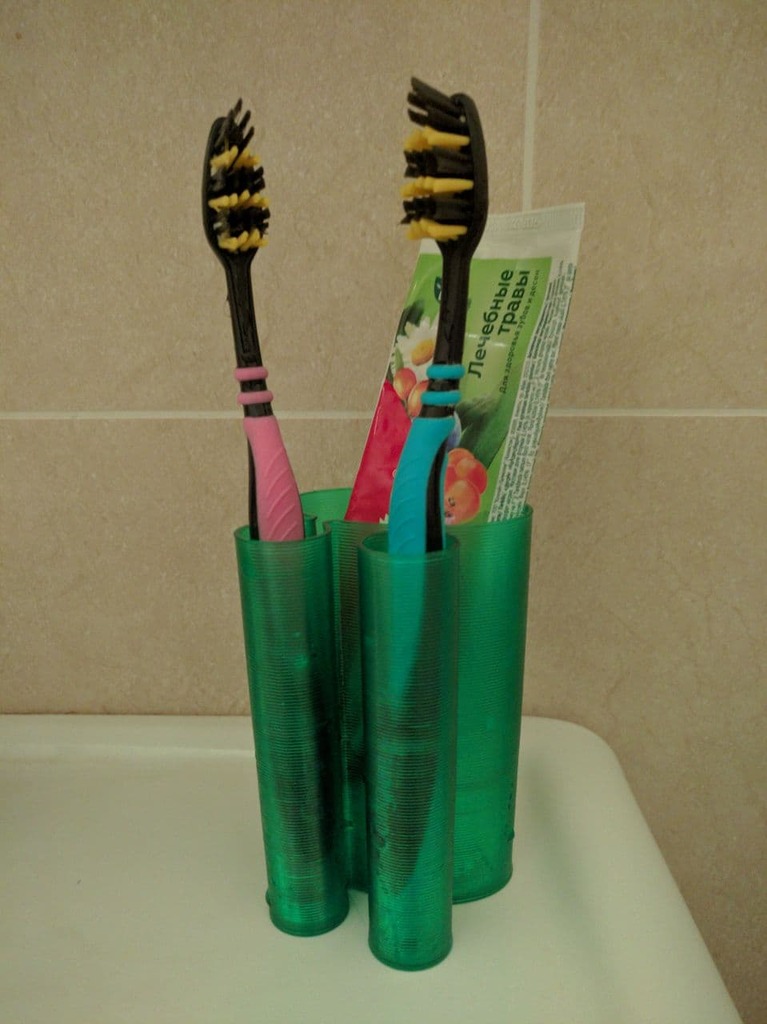 Vase mode toothbrush & toothpaste cup