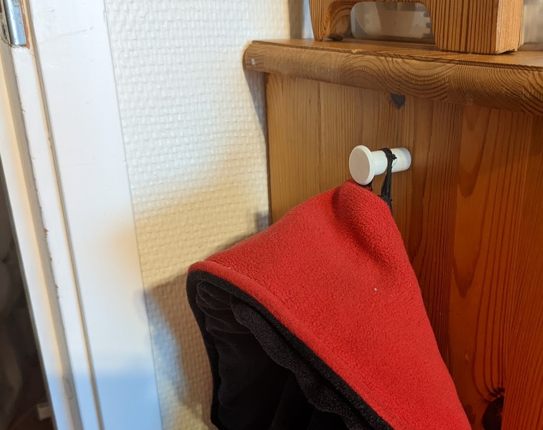 Practical hook with hidden screw