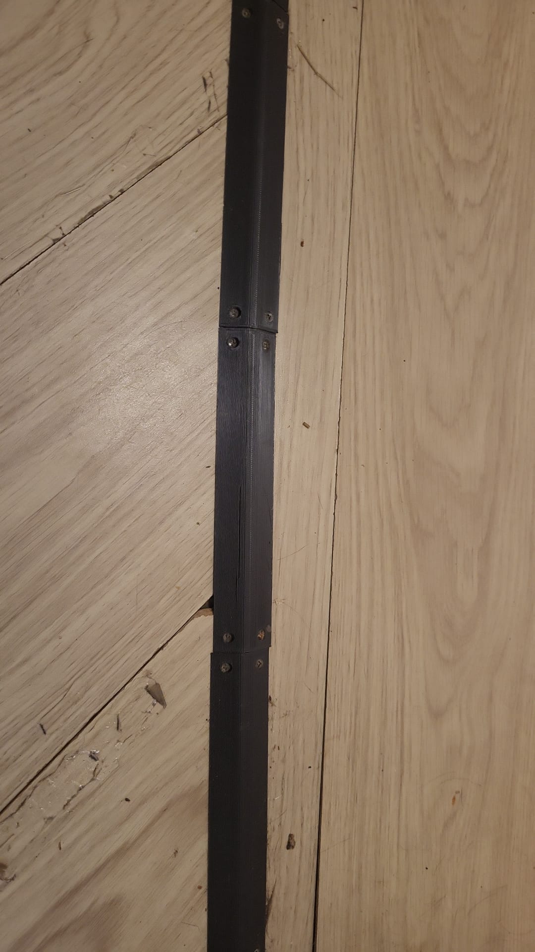 cable cover for floor with screwholes