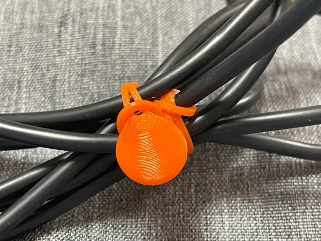 Cable Tie with a tab like gecko finger.
