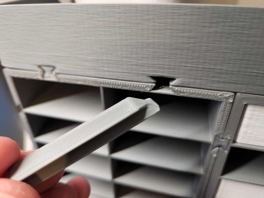 Loose fit modular peg