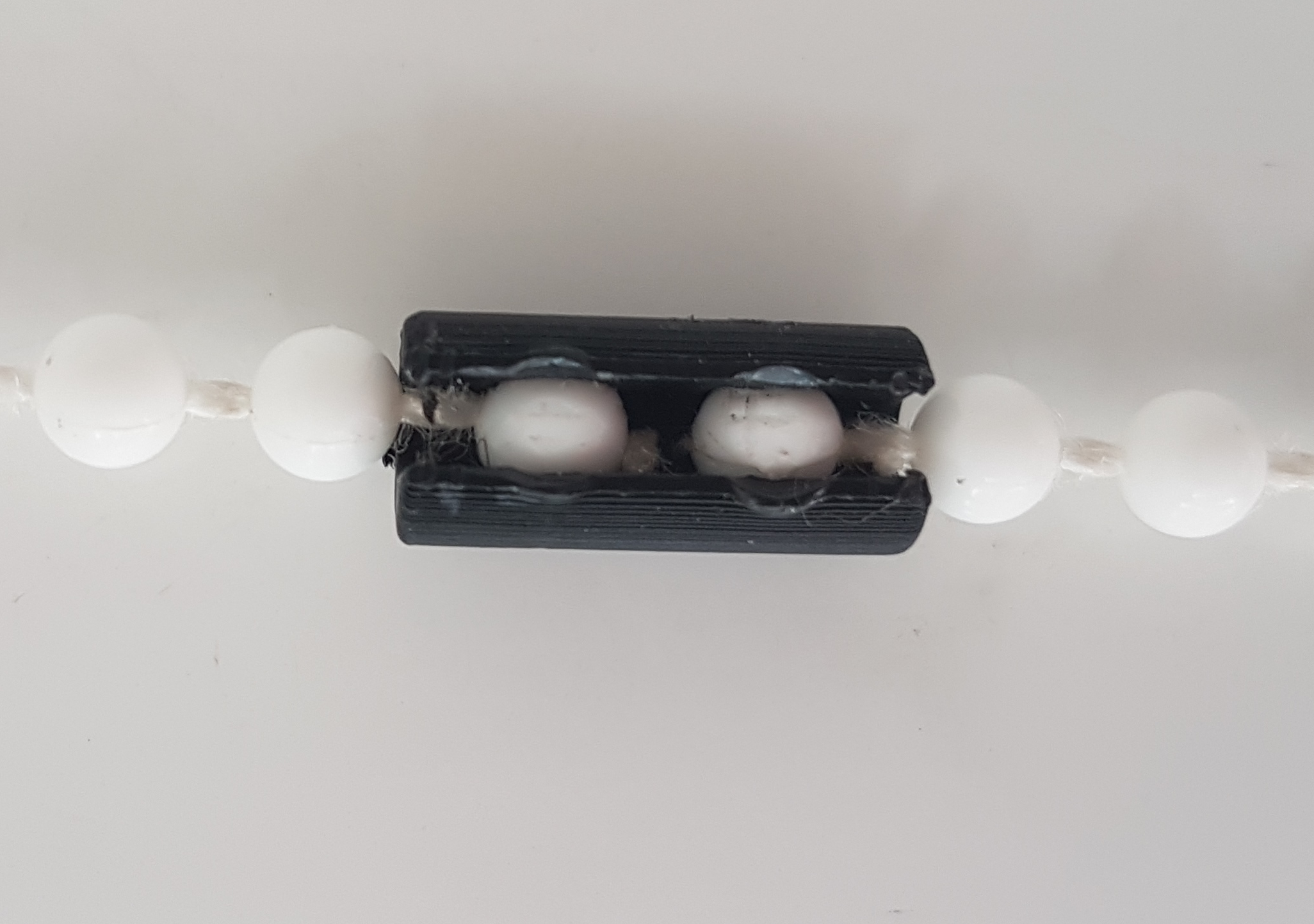 Ball chain joiner