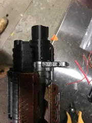 Nerf rapidstrike battery tray expander with barrel attach