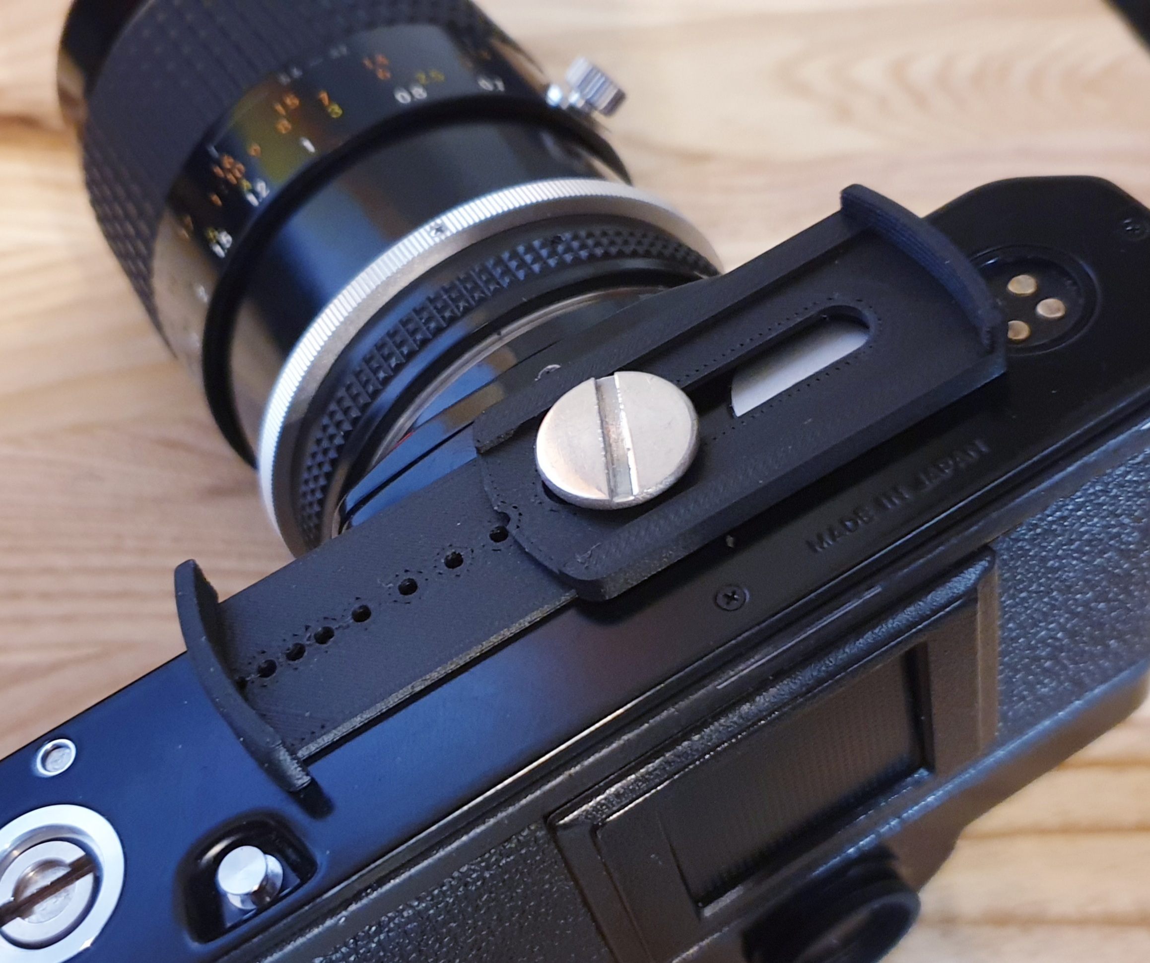 Camera Lens Cap Holder (4982mm) by Boopidoo Download free STL model