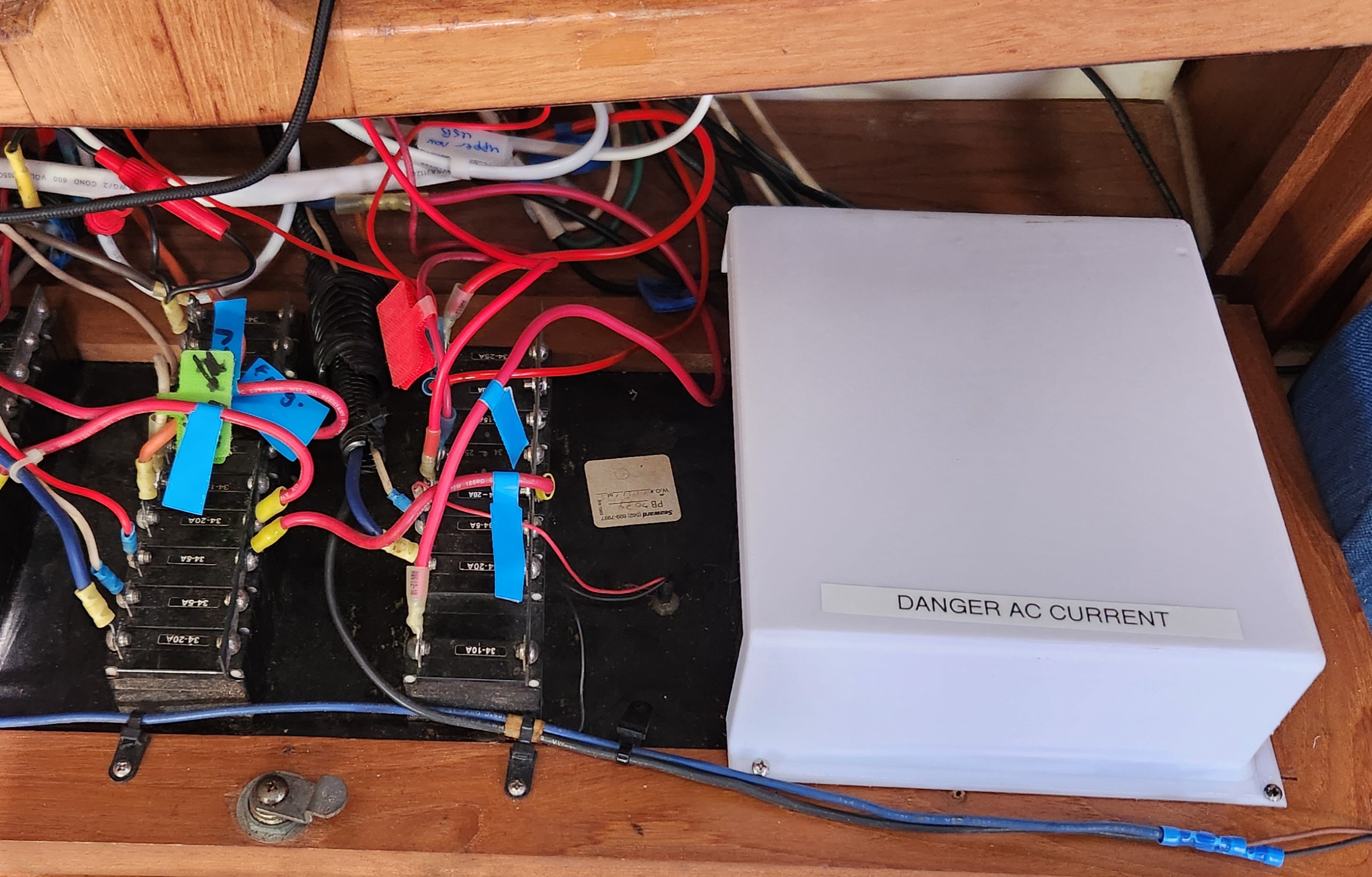 Sailboat AC power isolation cover