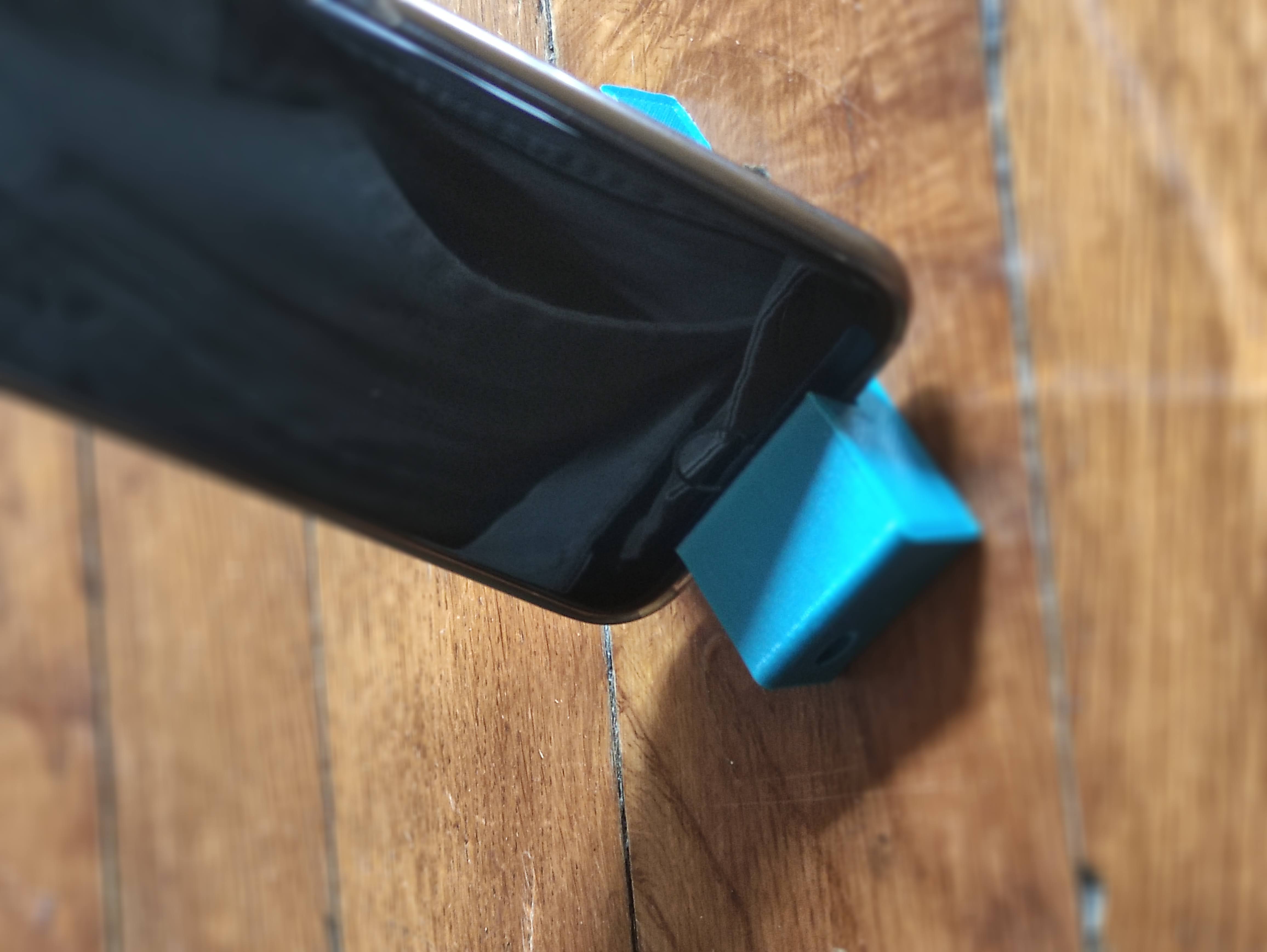 Charity smartphone and tablet holder with key ring hole