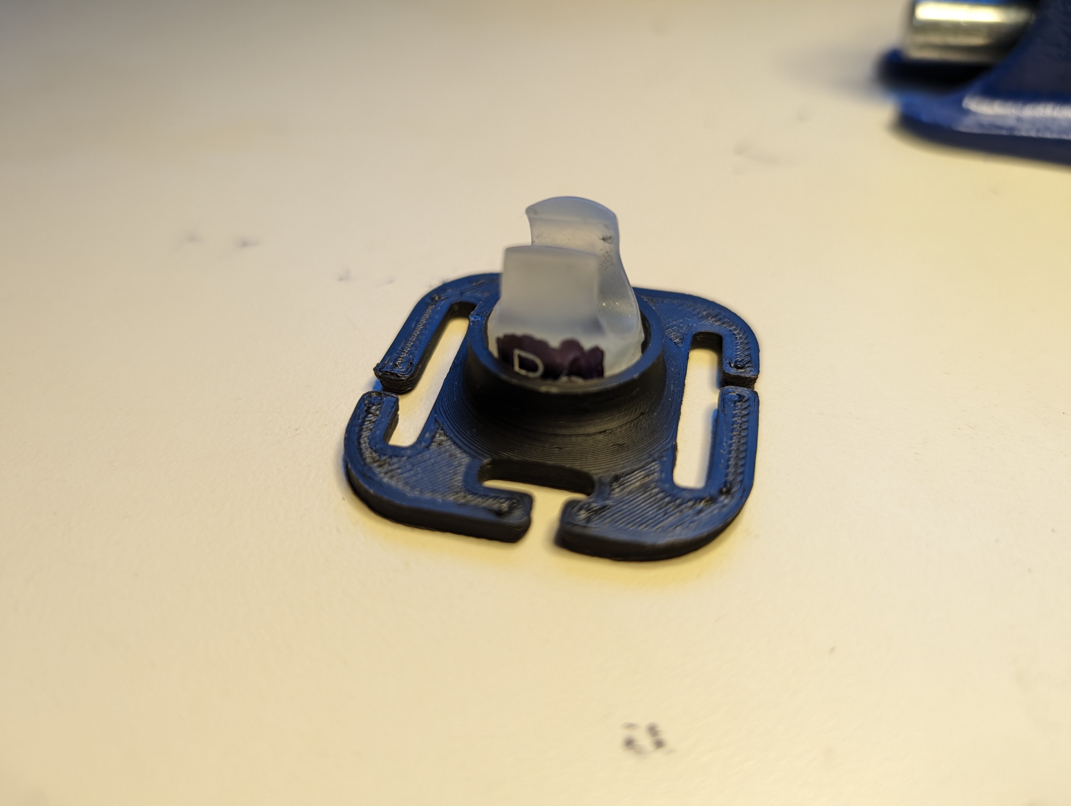 Magnetic hydration hose retaining clip