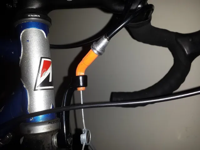 Cantilever brake hanger angle adapter