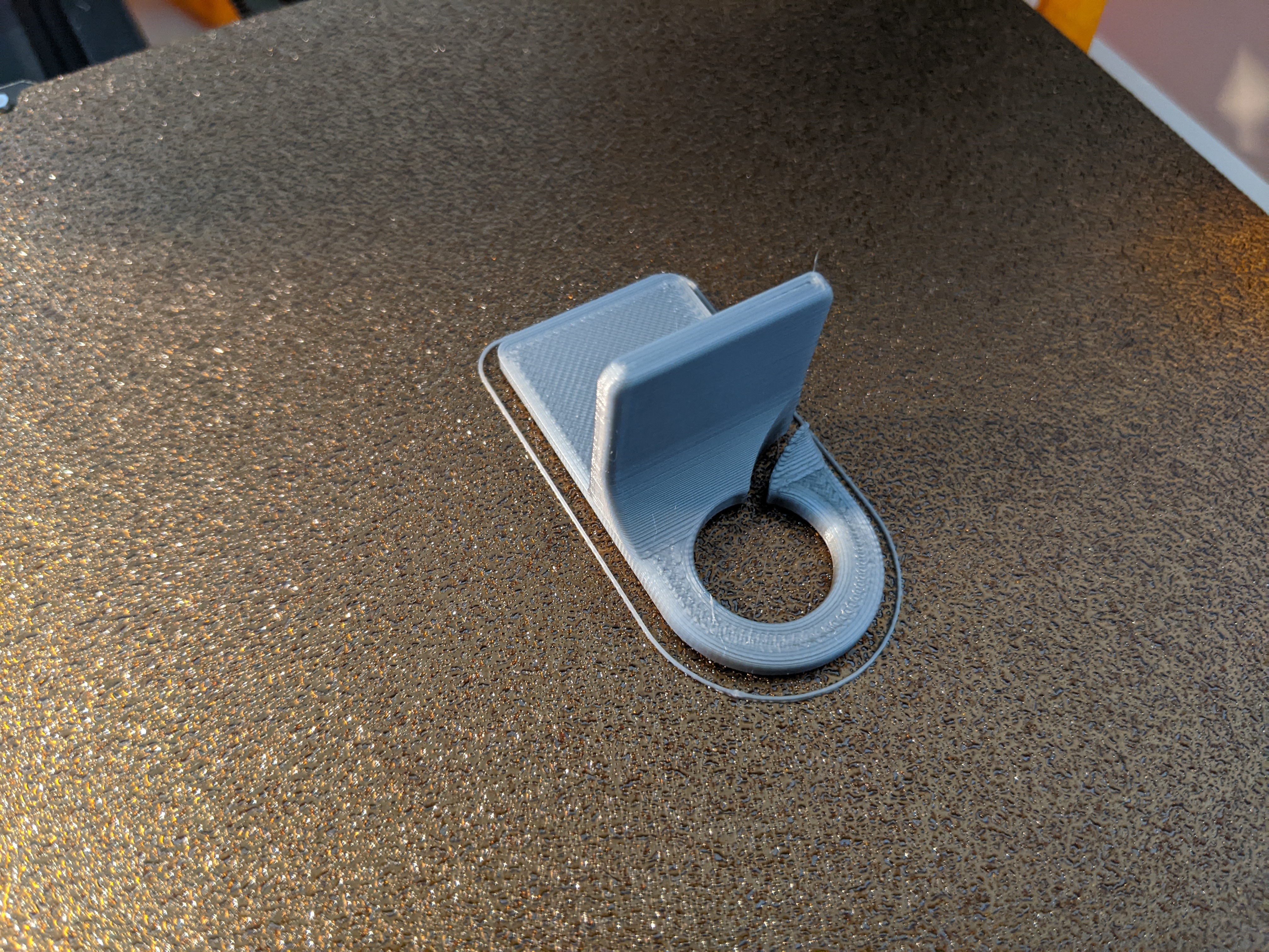 Filament guide hook for corners