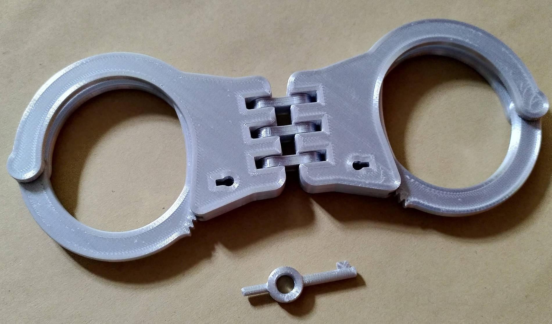 Triple hinge handcuffs by printcuffs | Download free STL model ...