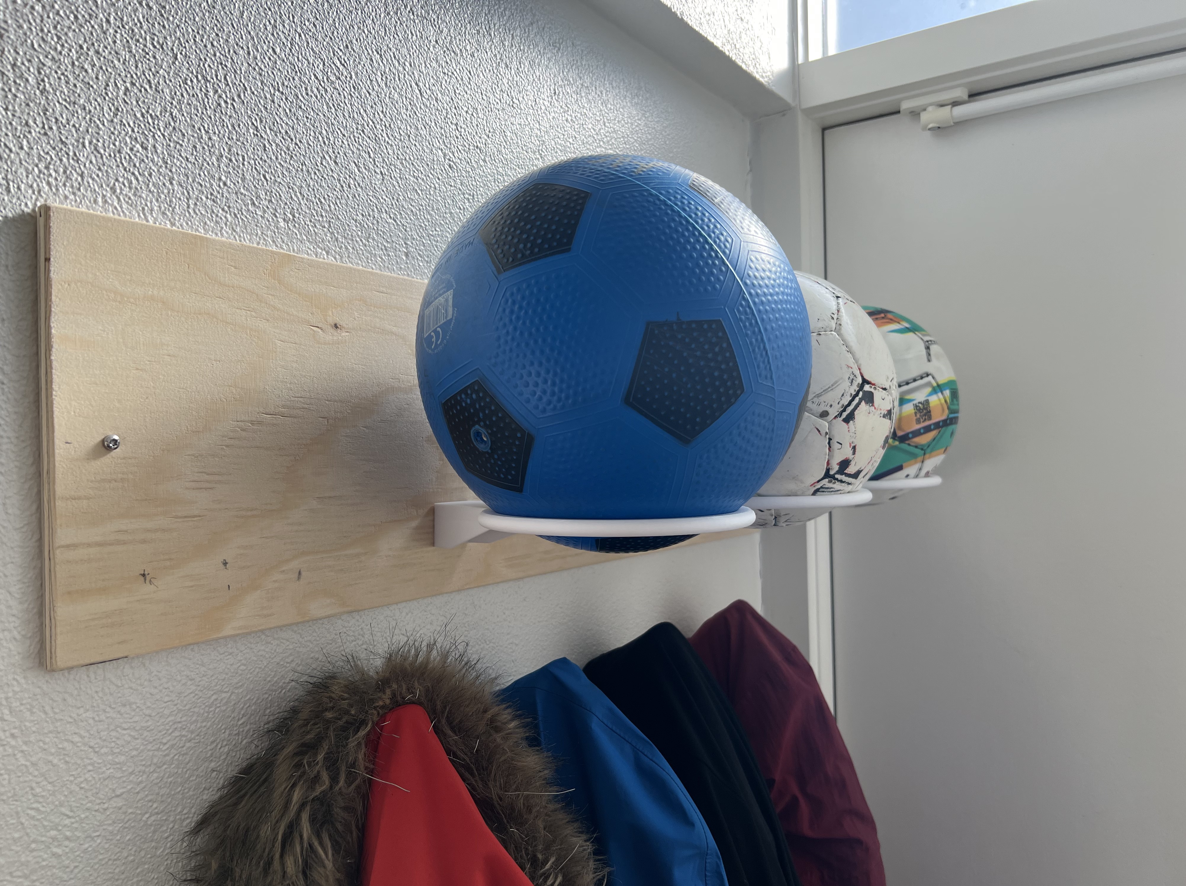 Football holder (wall mounted)